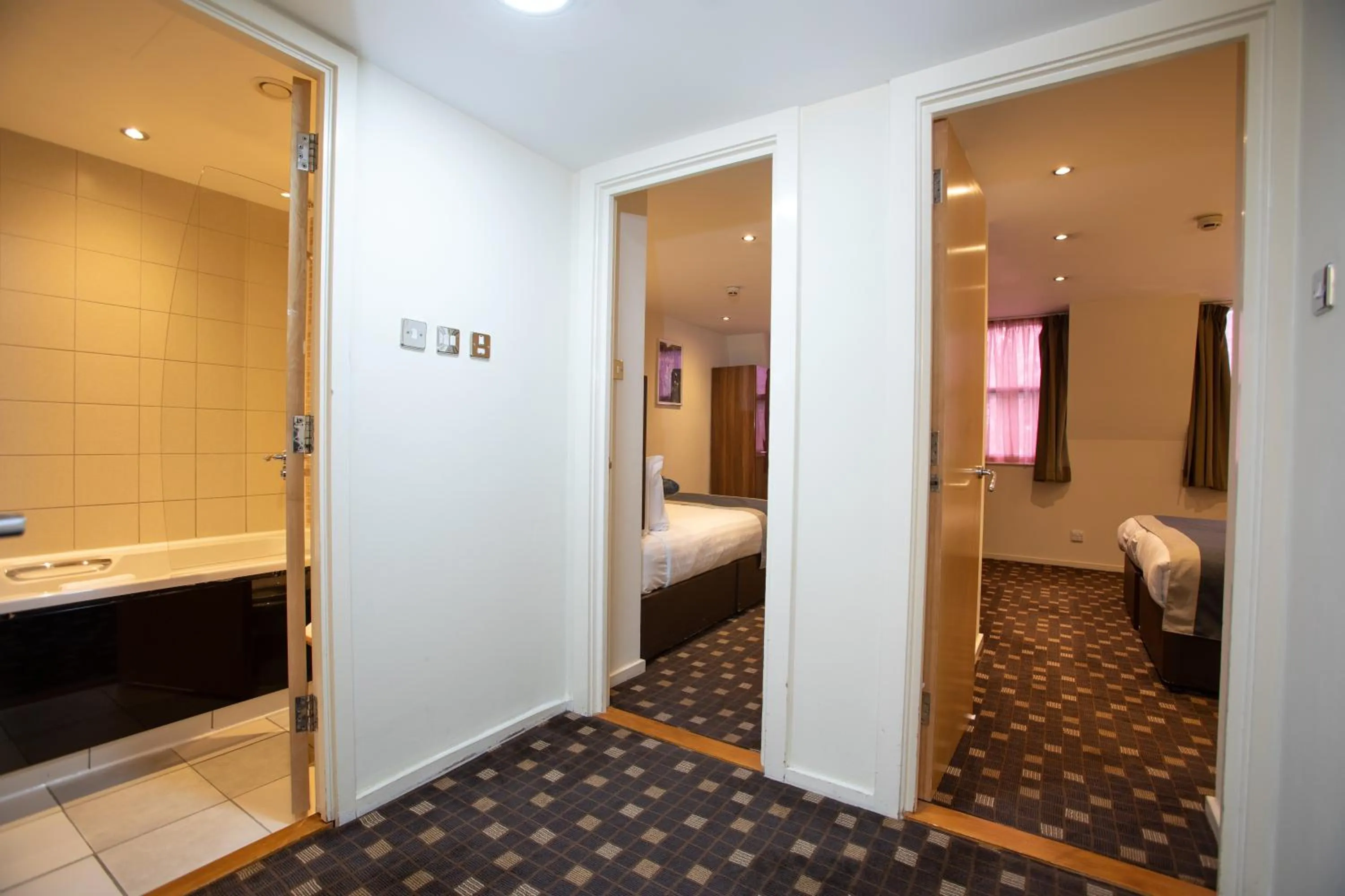 Bathroom, Bed in Grand Plaza Serviced Apartments