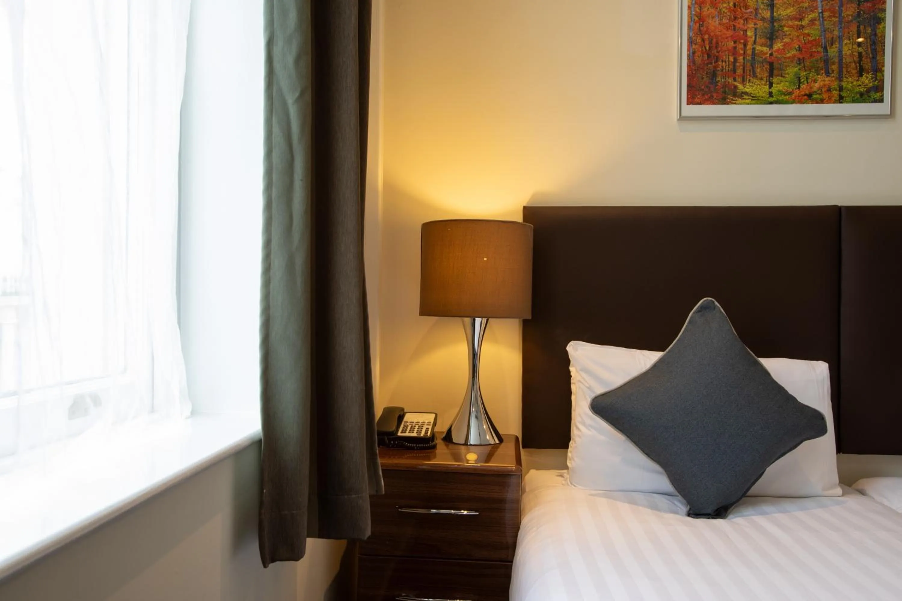 Bed in Grand Plaza Serviced Apartments