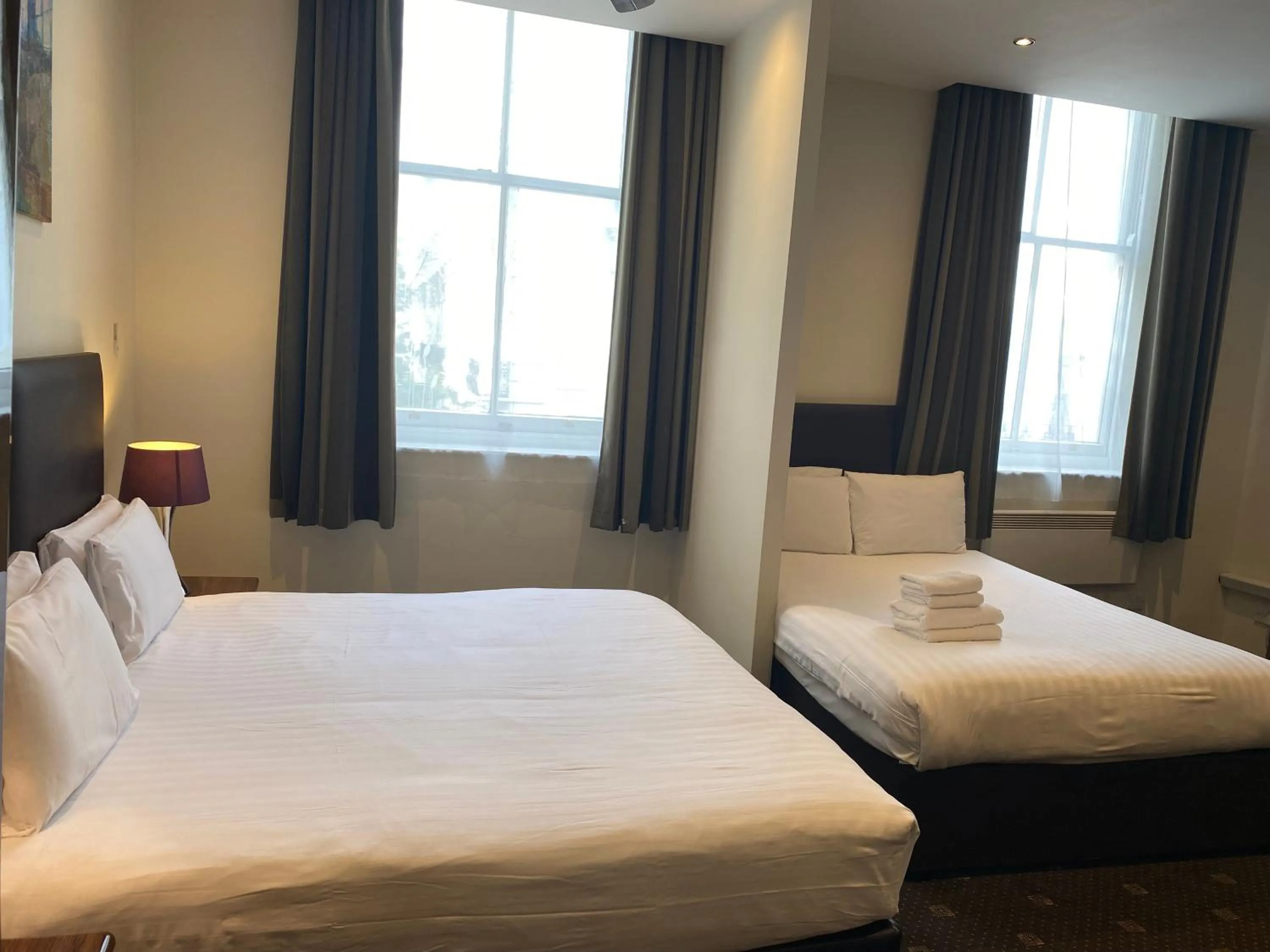 Photo of the whole room, Bed in Grand Plaza Serviced Apartments