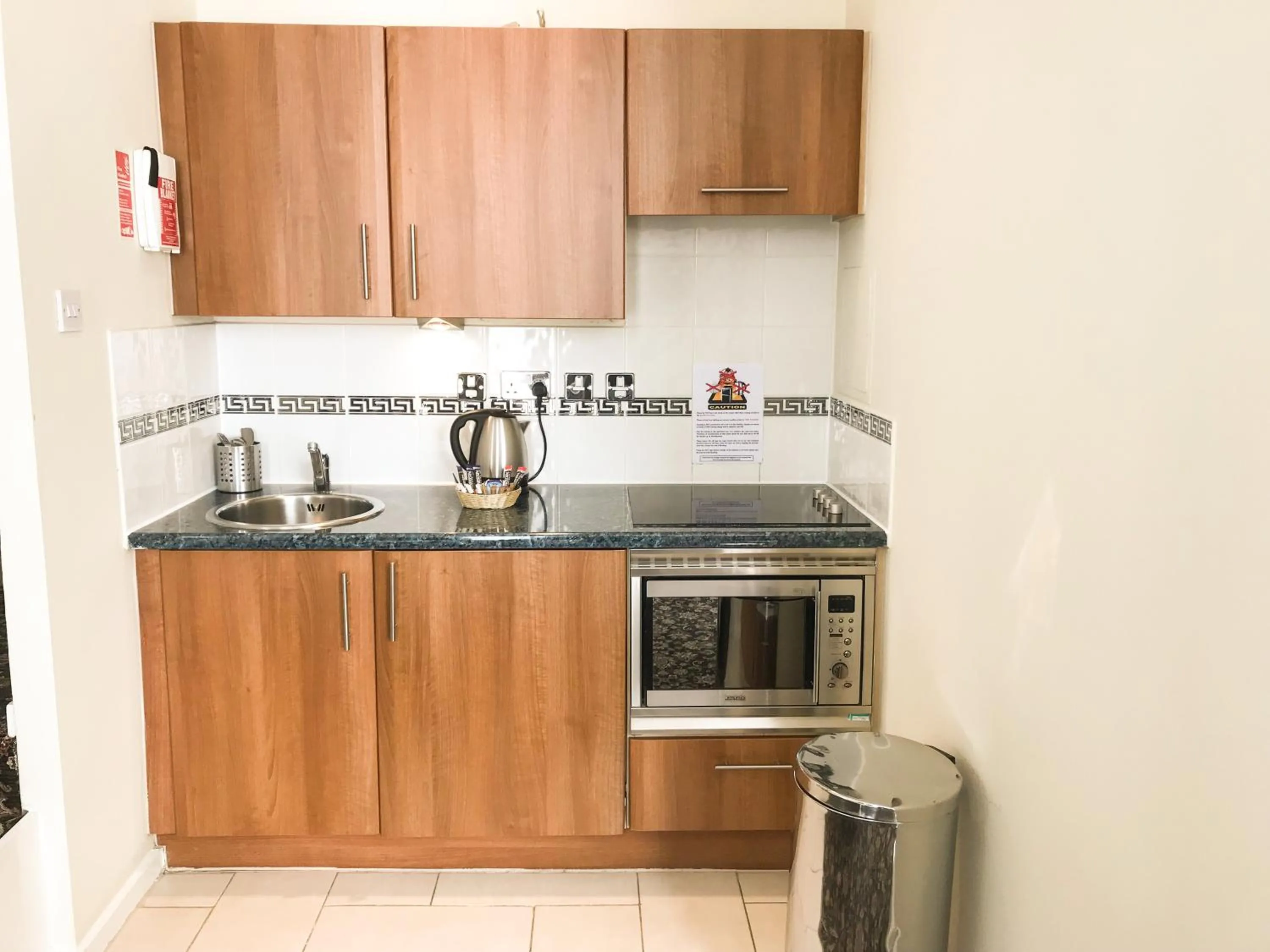 Kitchen or kitchenette in Grand Plaza Serviced Apartments