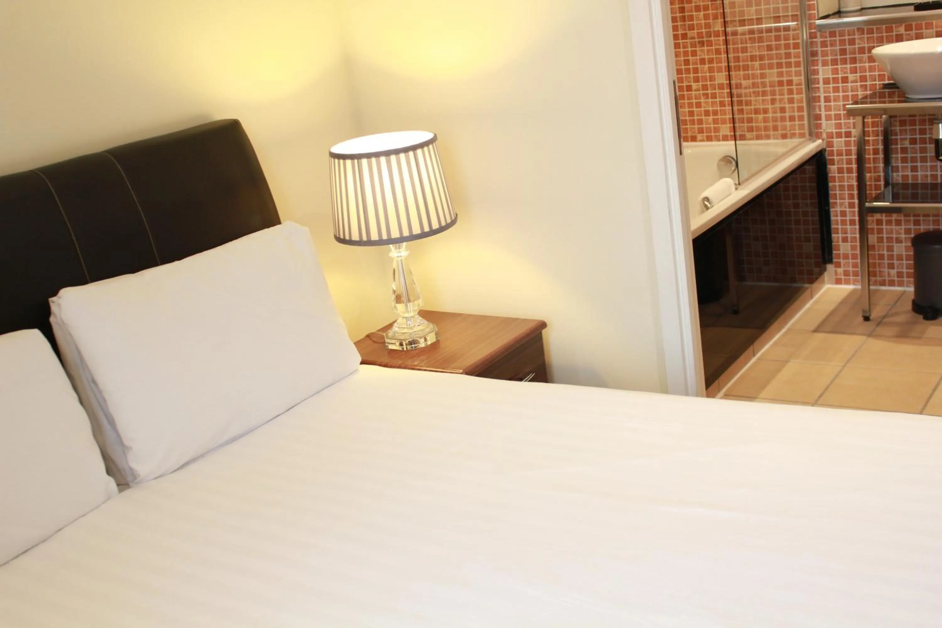 Bed in Grand Plaza Serviced Apartments