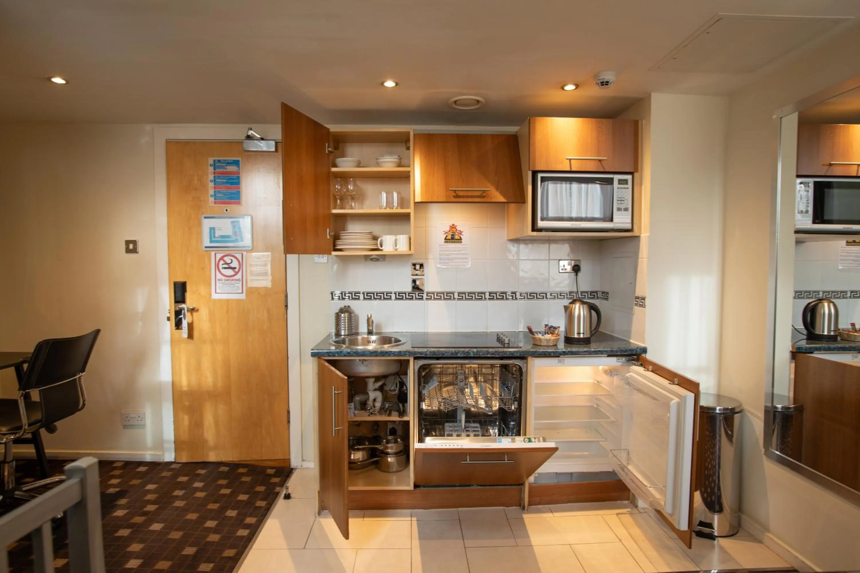 Kitchen or kitchenette in Grand Plaza Serviced Apartments