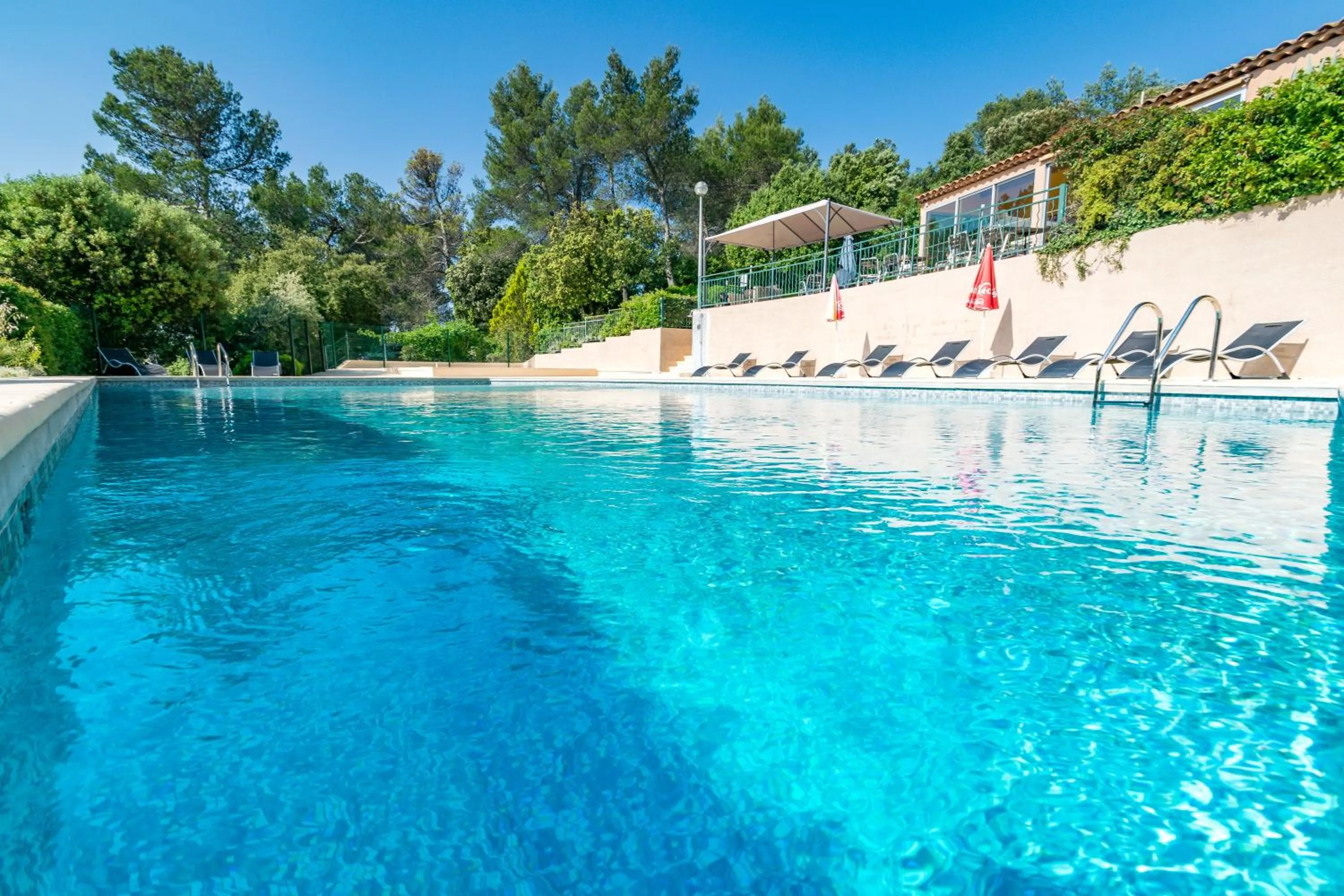 Swimming pool in Les Arbousiers Village Hôtel Provençal