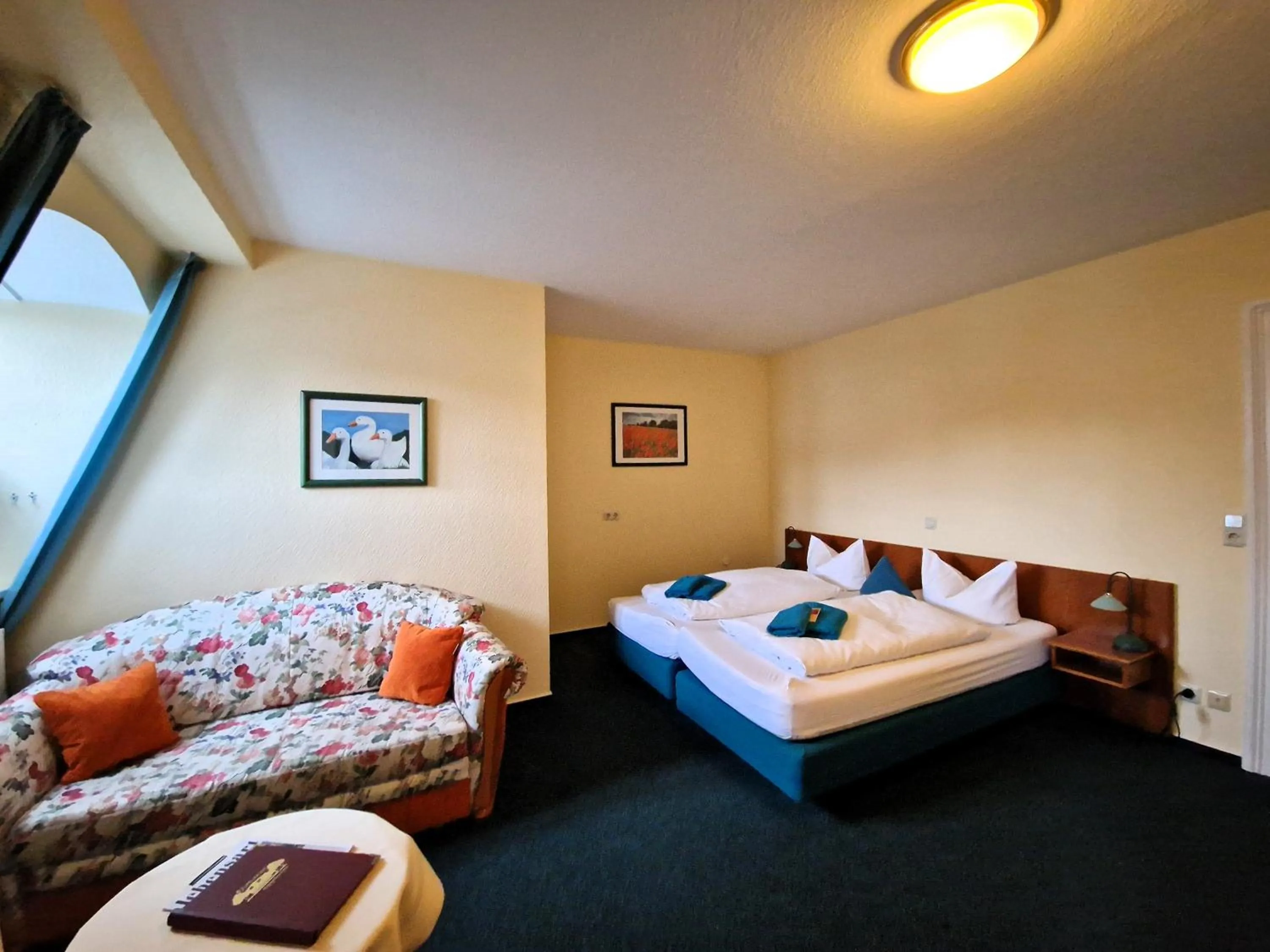 Photo of the whole room, Bed in Hotel Fährhaus Niederkleveez