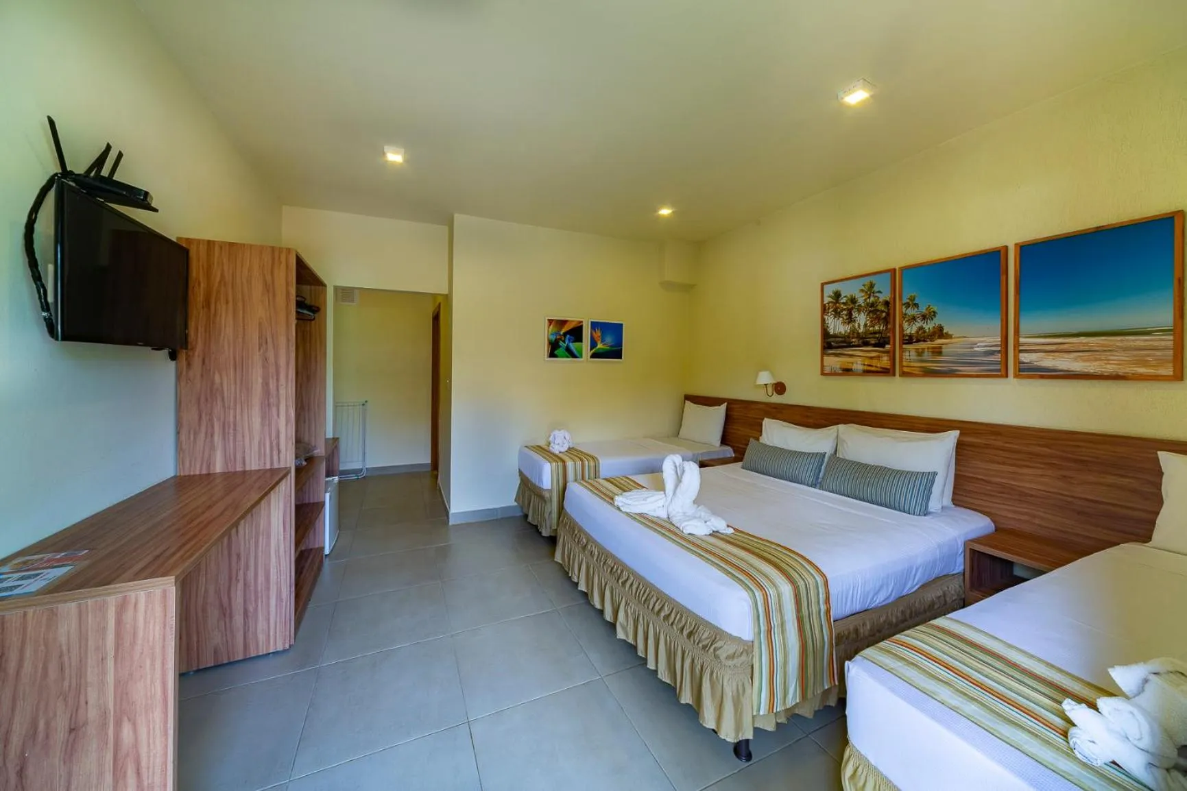 Bed in Pousada Tropicarim