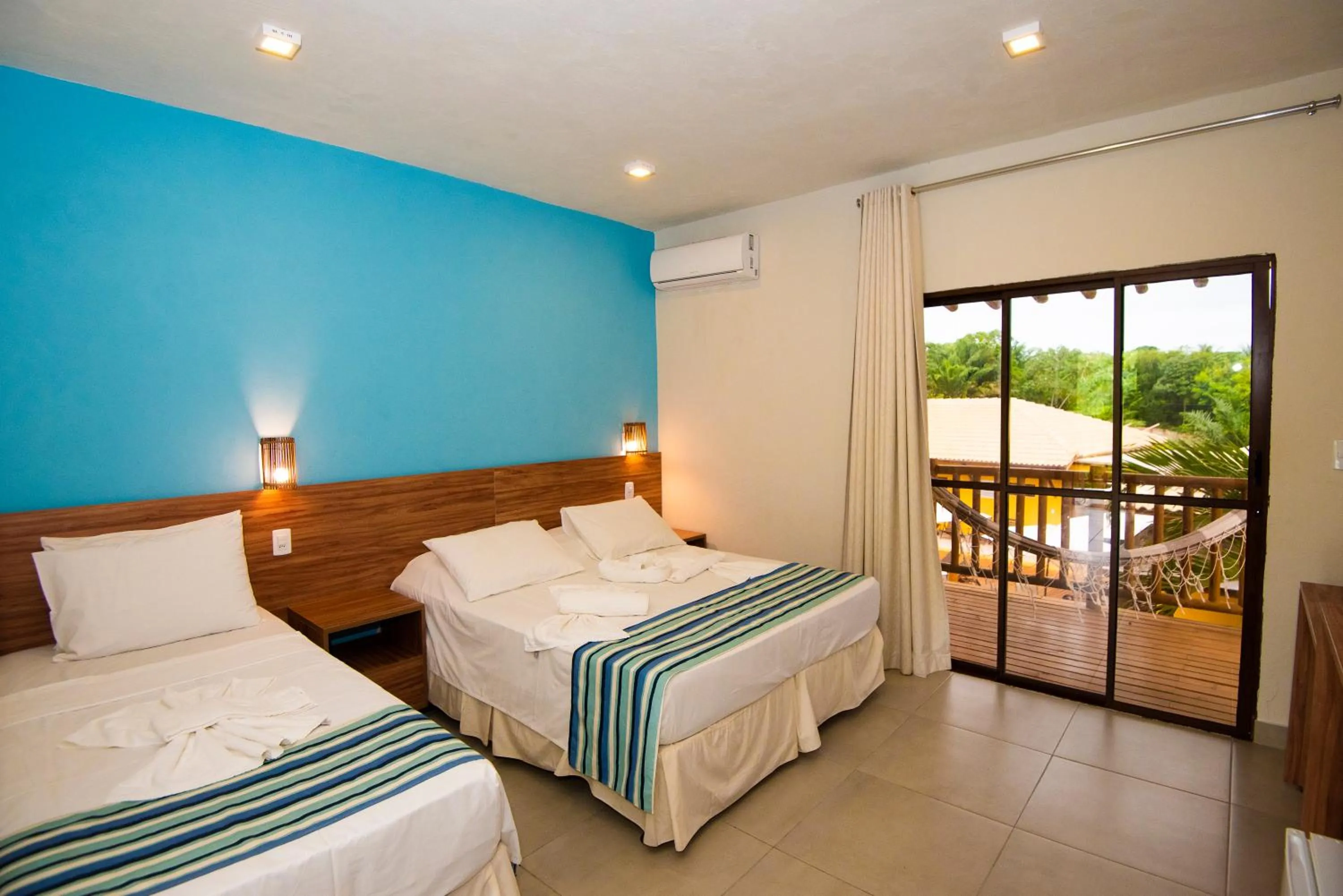 Photo of the whole room, Bed in Pousada Tropicarim