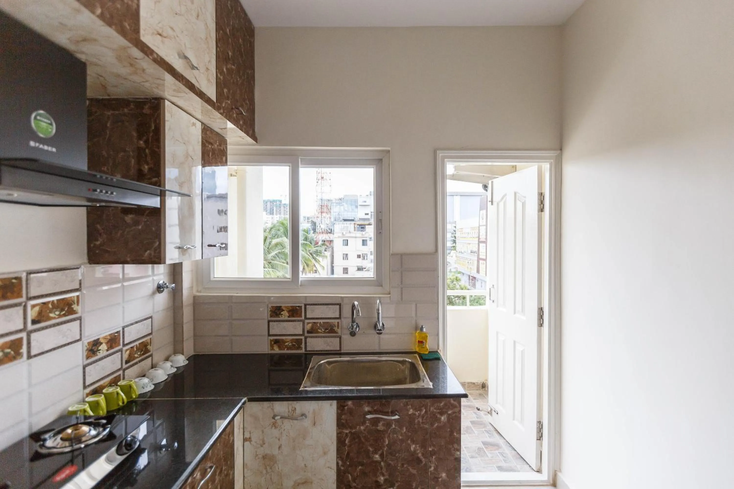 Kitchen or kitchenette in Mistyblue Serviced Apartments