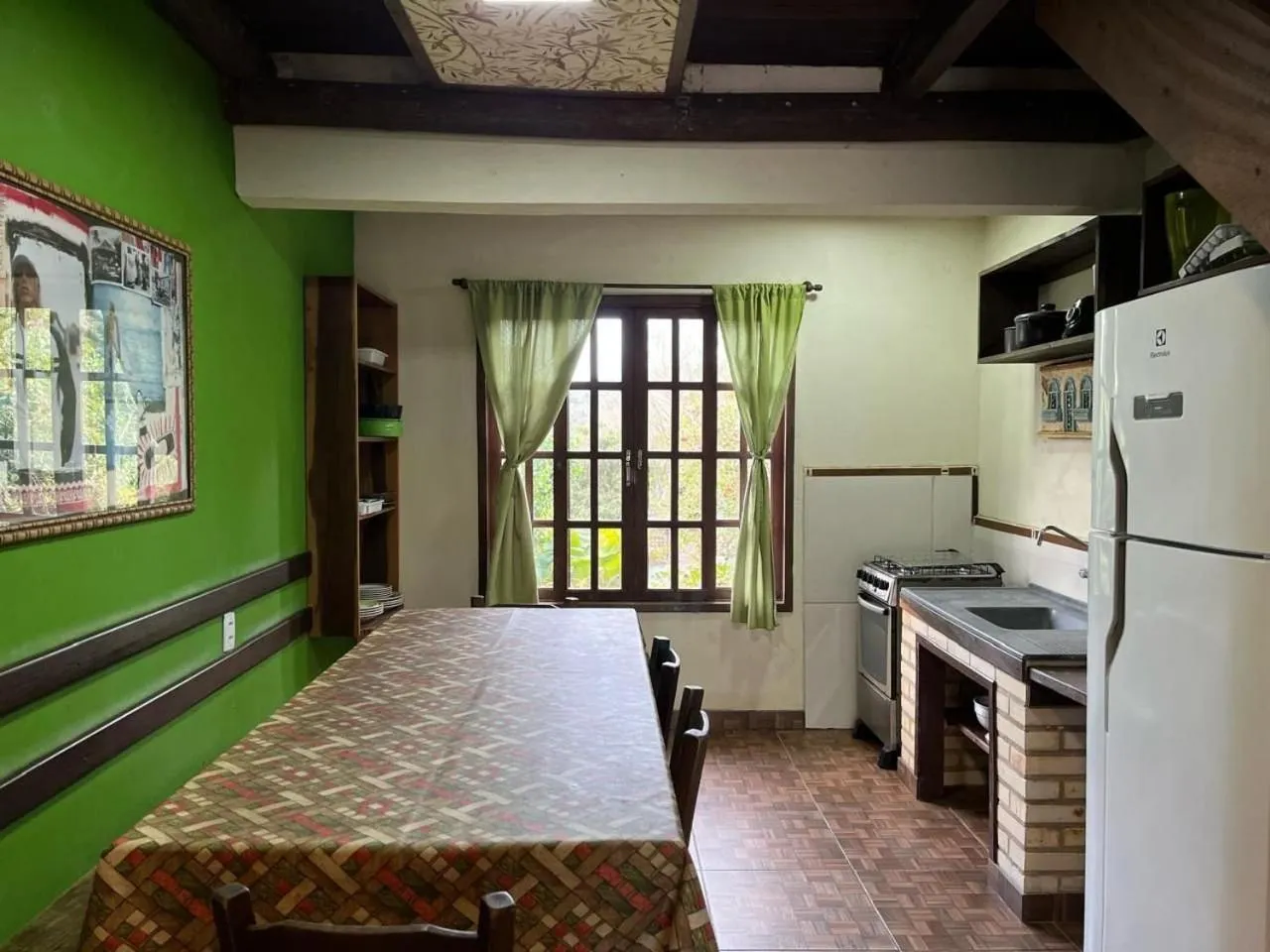 Kitchen or kitchenette, Bed in Pousada vale verde bungalows - Praia do Rosa