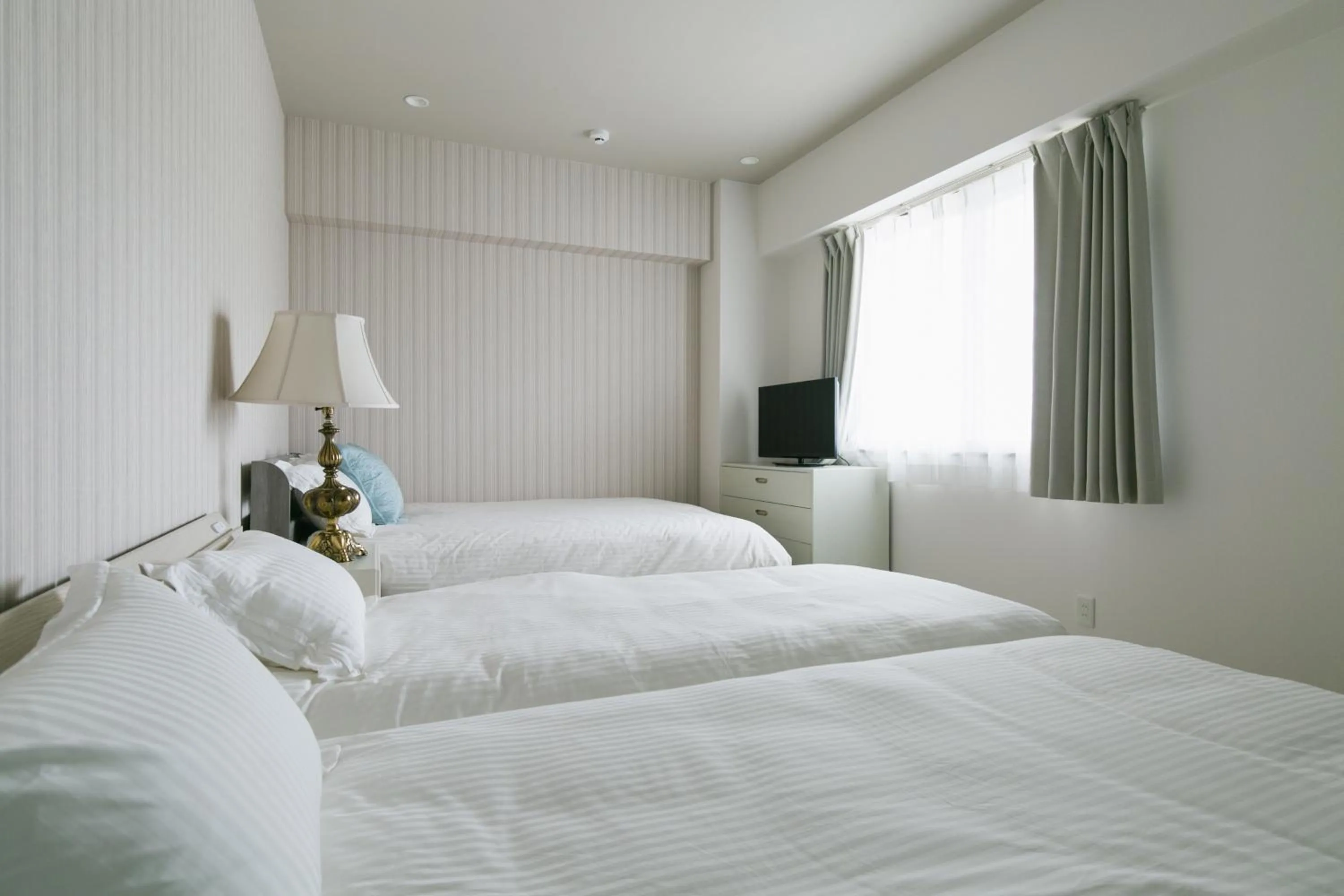 Bedroom, Bed in Hideout Okinawa Uruma