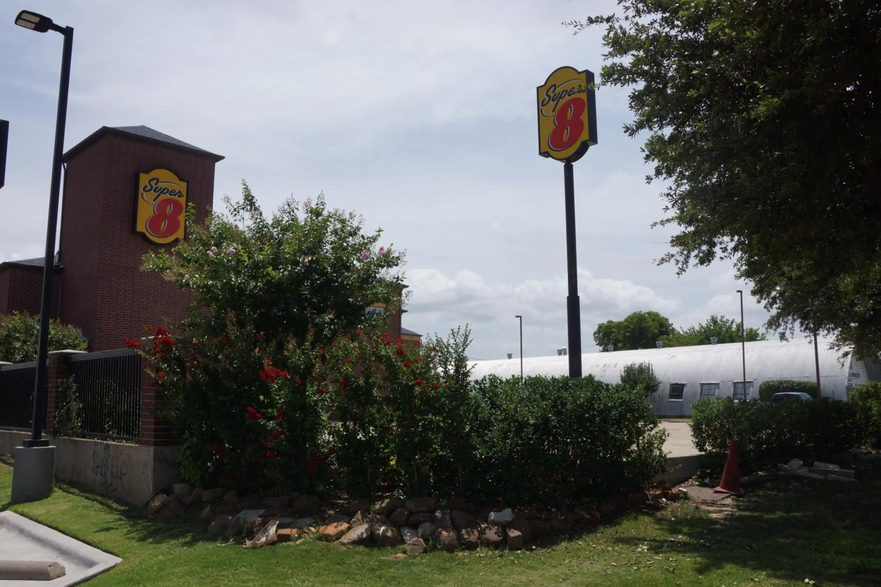 Property building in Super 8 by Wyndham Farmers Branch/North Dallas