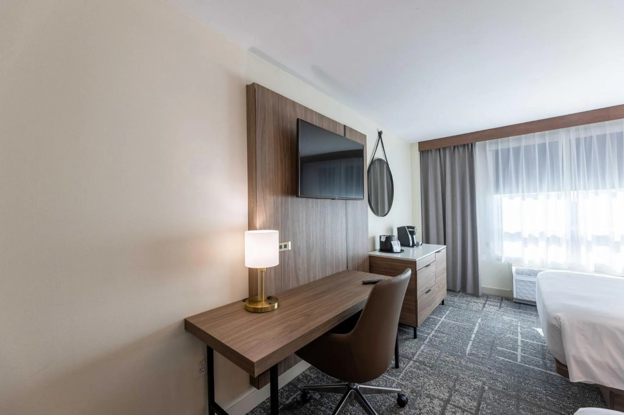 Photo of the whole room, Bed in Crowne Plaza Houston Galleria Area by IHG