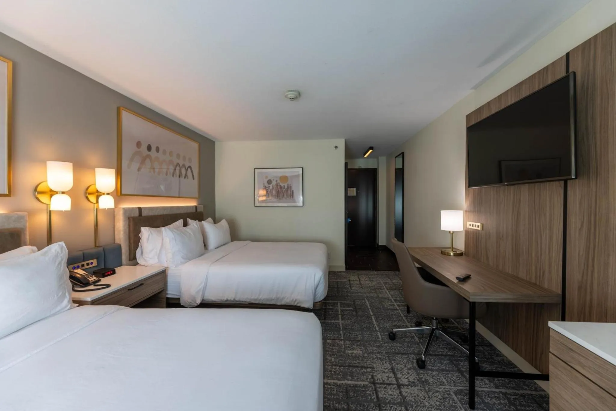 Photo of the whole room, Bed in Crowne Plaza Houston Galleria Area by IHG