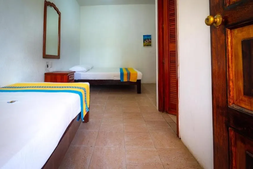 Bed in Hotel Bungalows Acuario