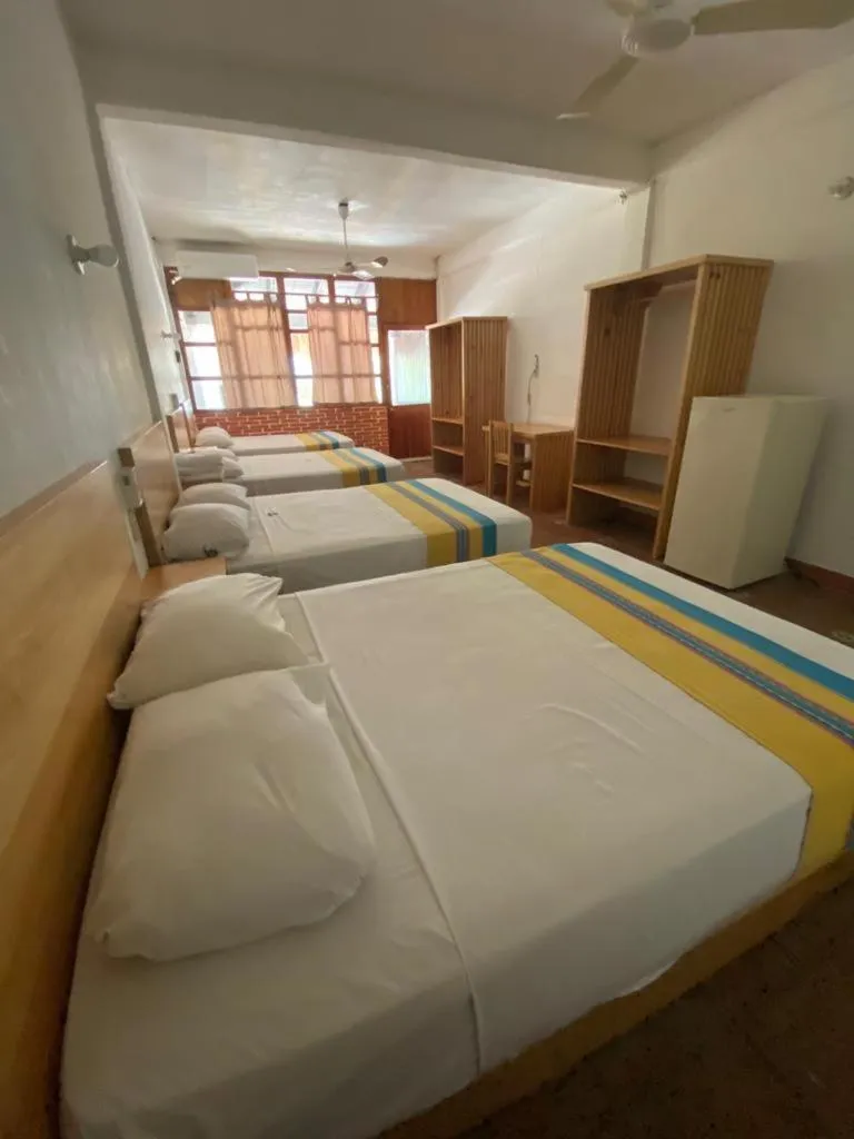 Bed in Hotel Bungalows Acuario