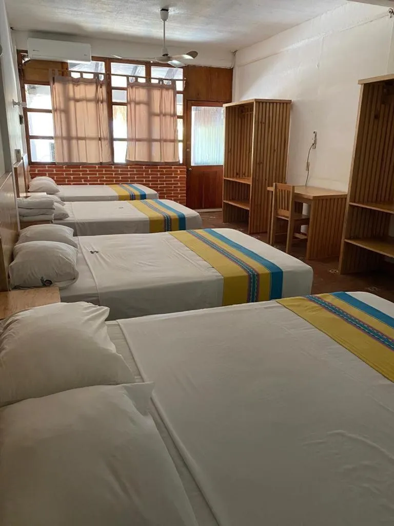 Bed in Hotel Bungalows Acuario