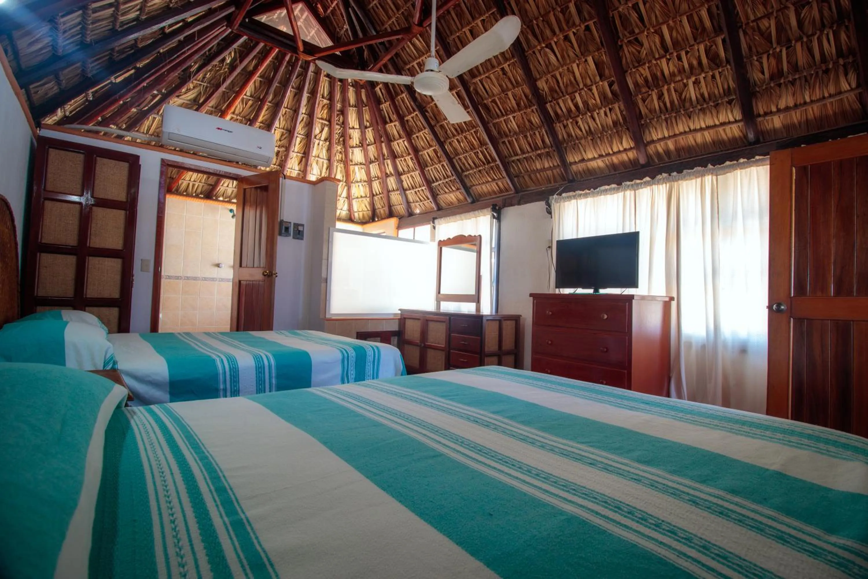 Bed in Hotel Bungalows Acuario