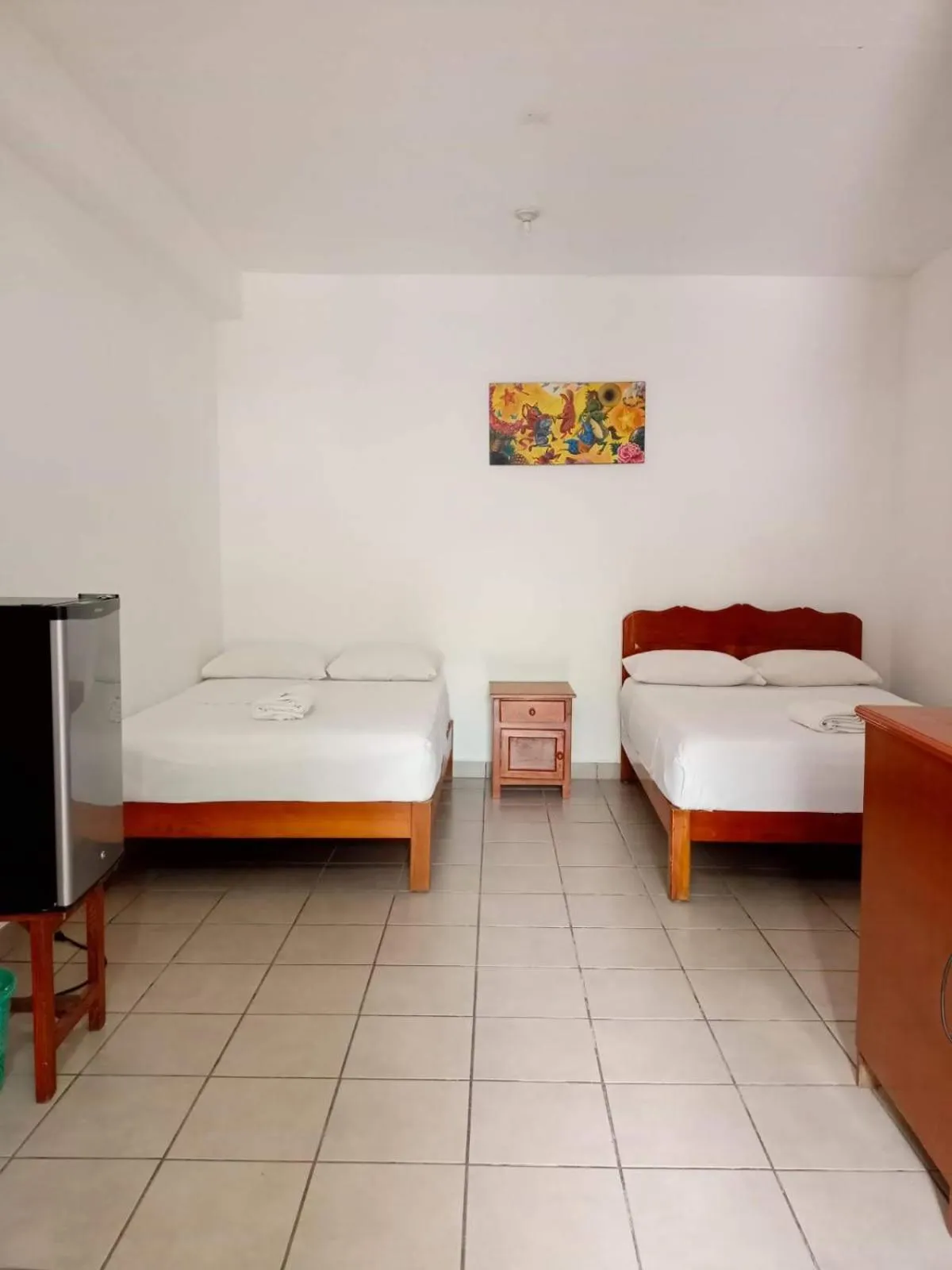 Bed in Hotel Bungalows Acuario