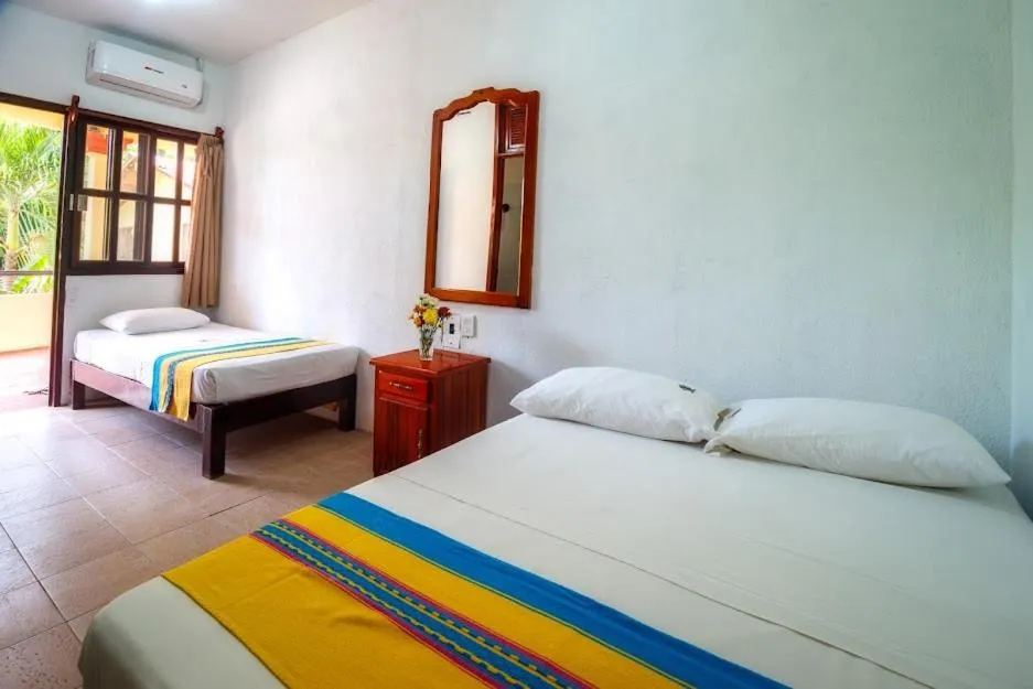 Bed in Hotel Bungalows Acuario