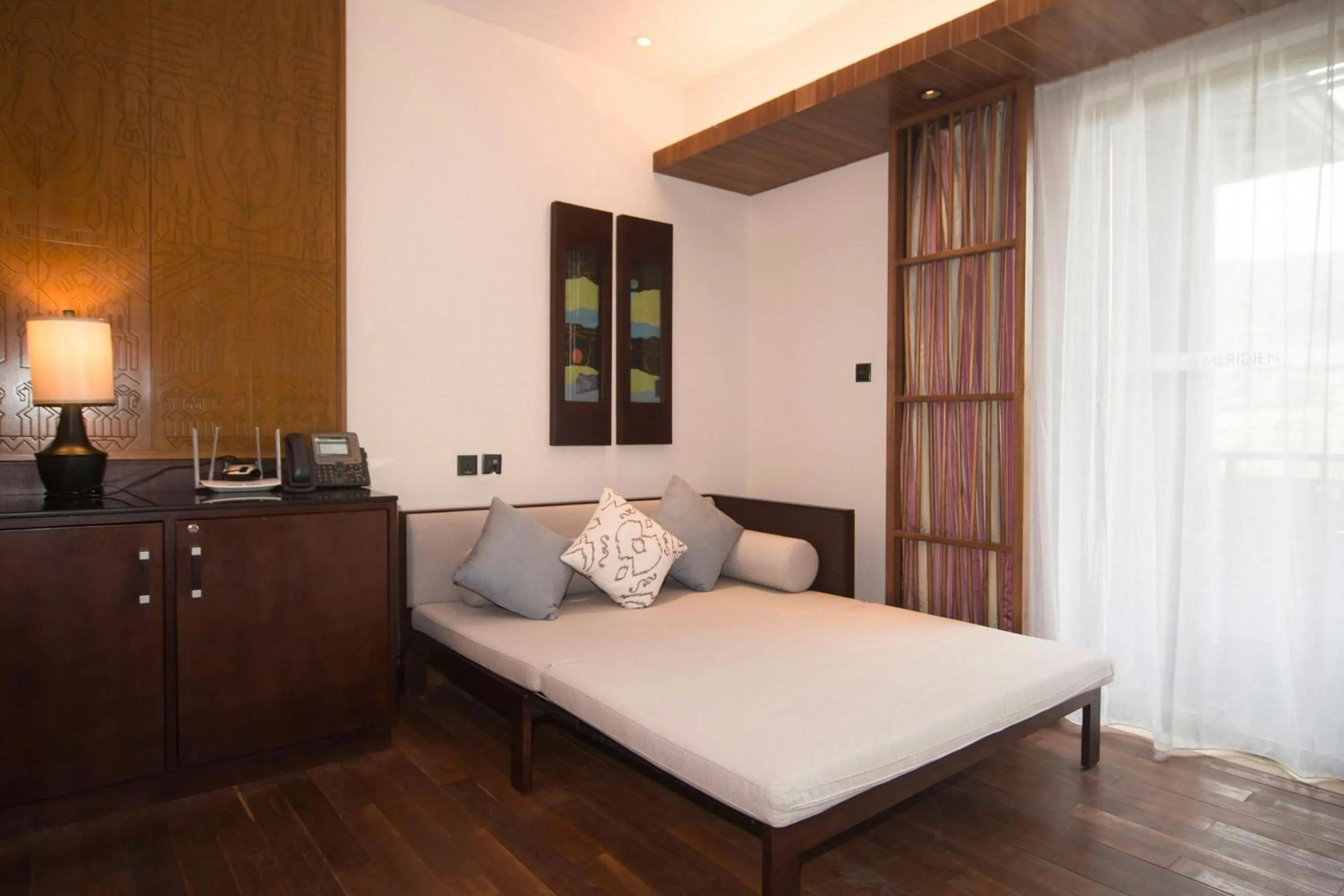 Photo of the whole room, Bed in Le Méridien Shimei Bay Beach Resort & Spa