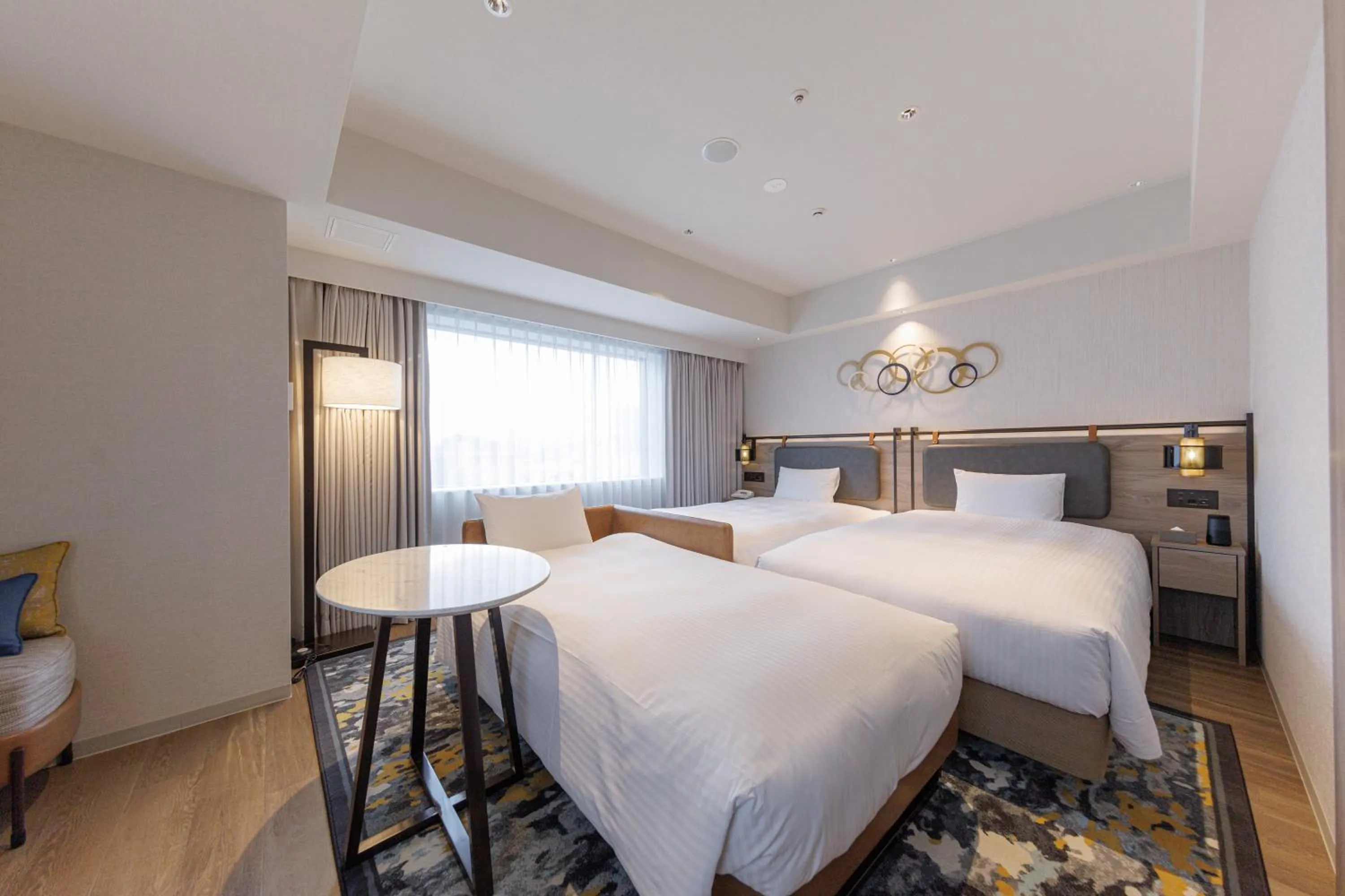 Bed in JR Kyushu Station Hotel Kokura