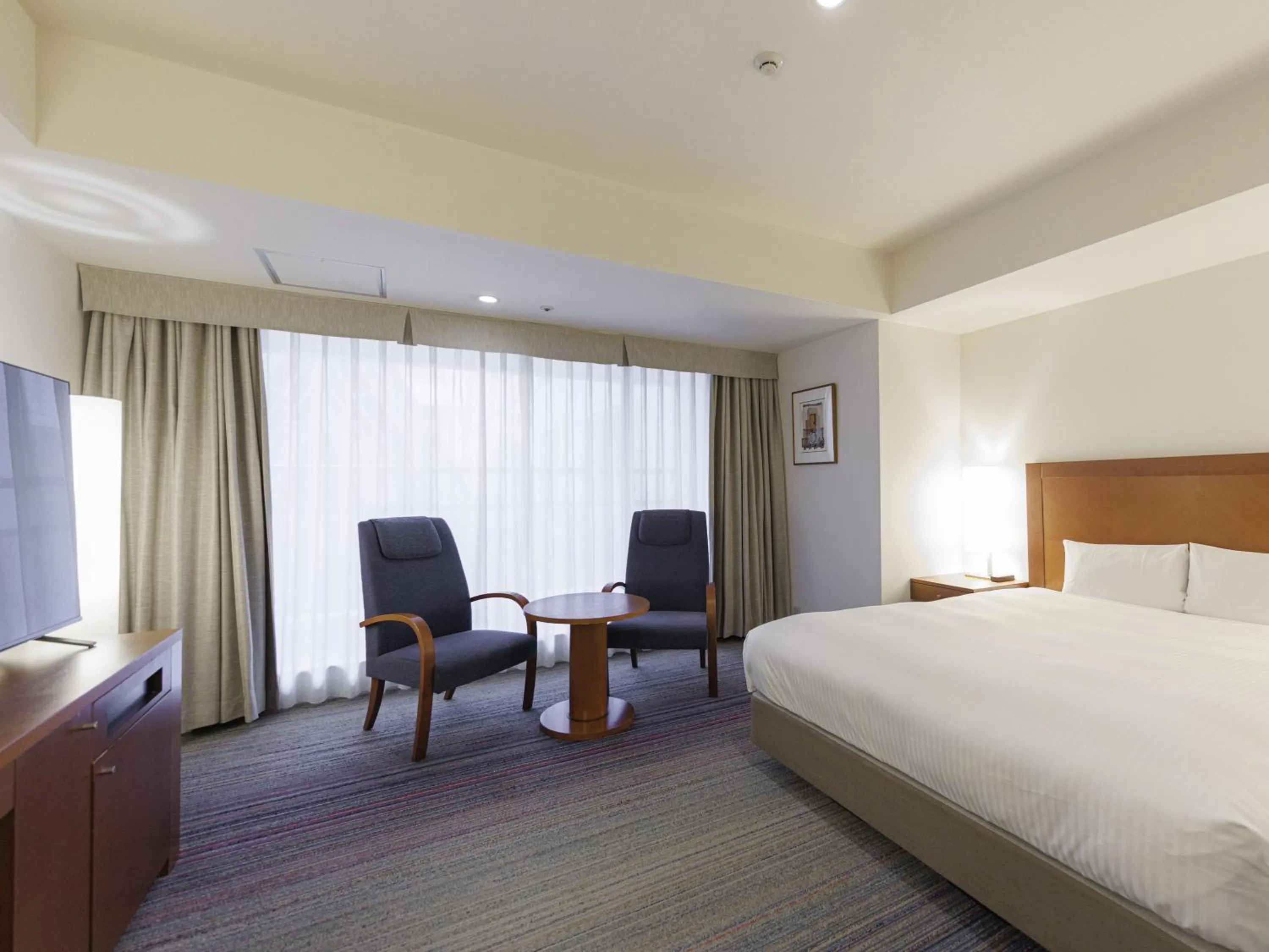 Bed in JR Kyushu Station Hotel Kokura