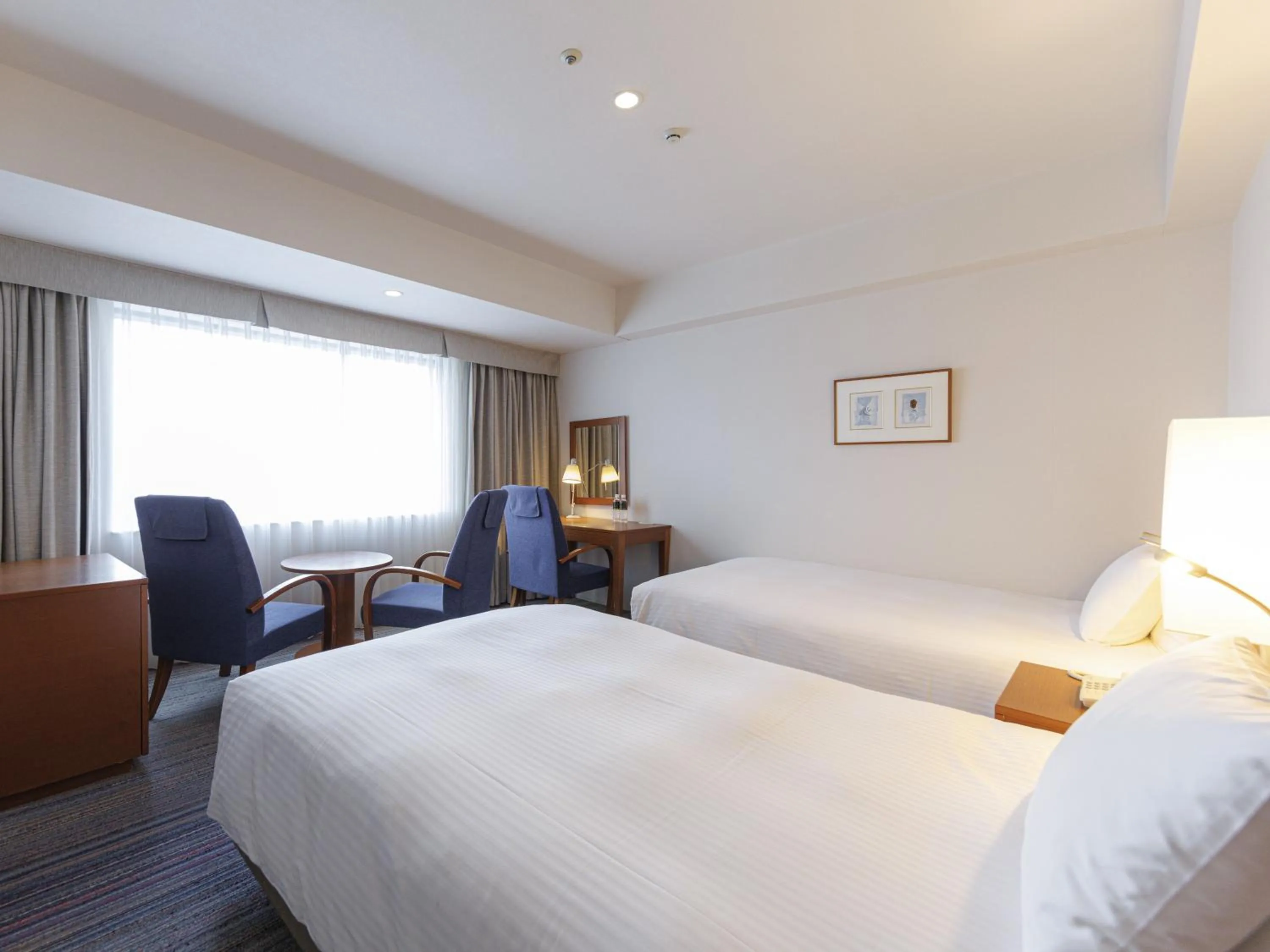 Bed in JR Kyushu Station Hotel Kokura