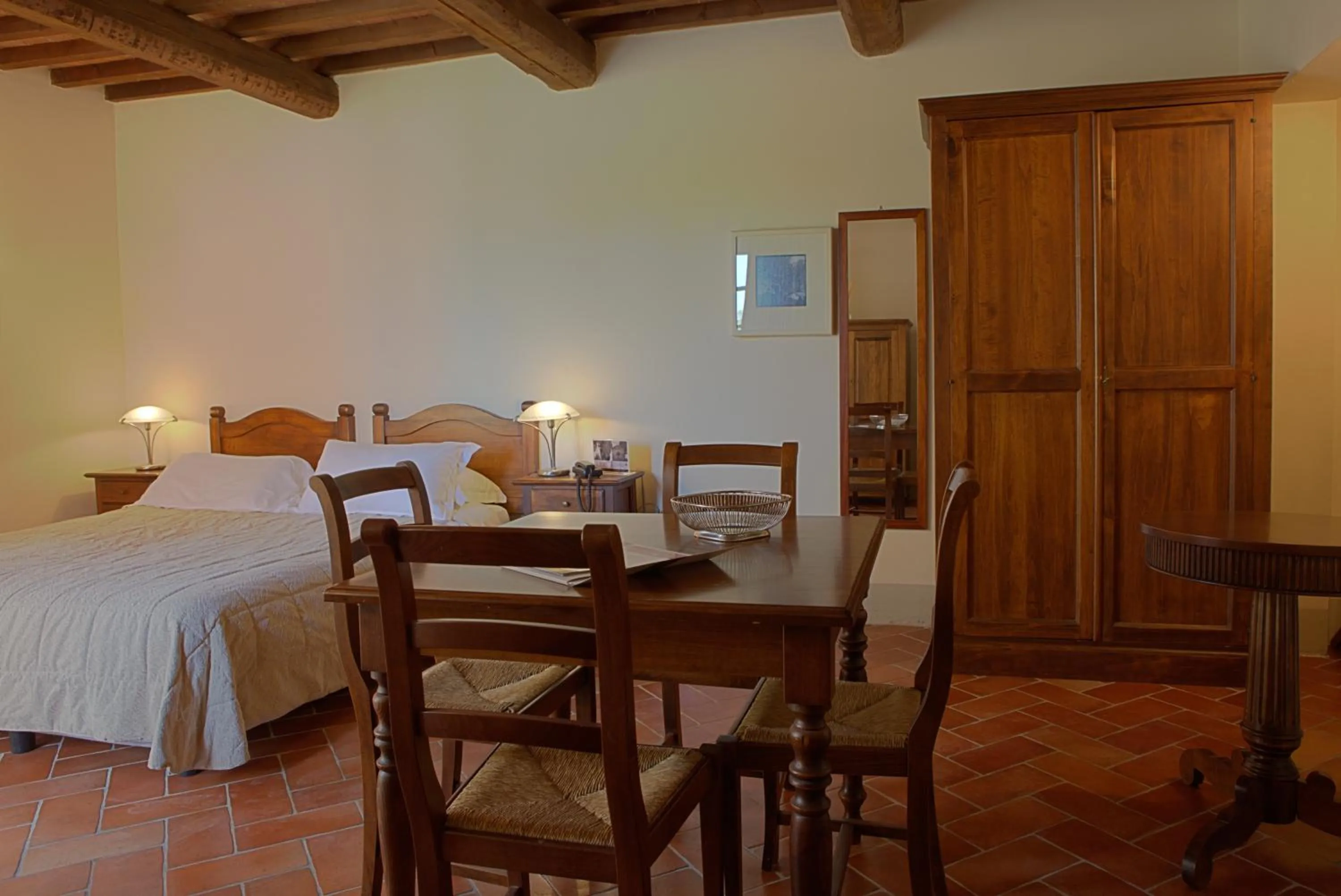 Seating area, Bed in Borgo Colleoli Resort