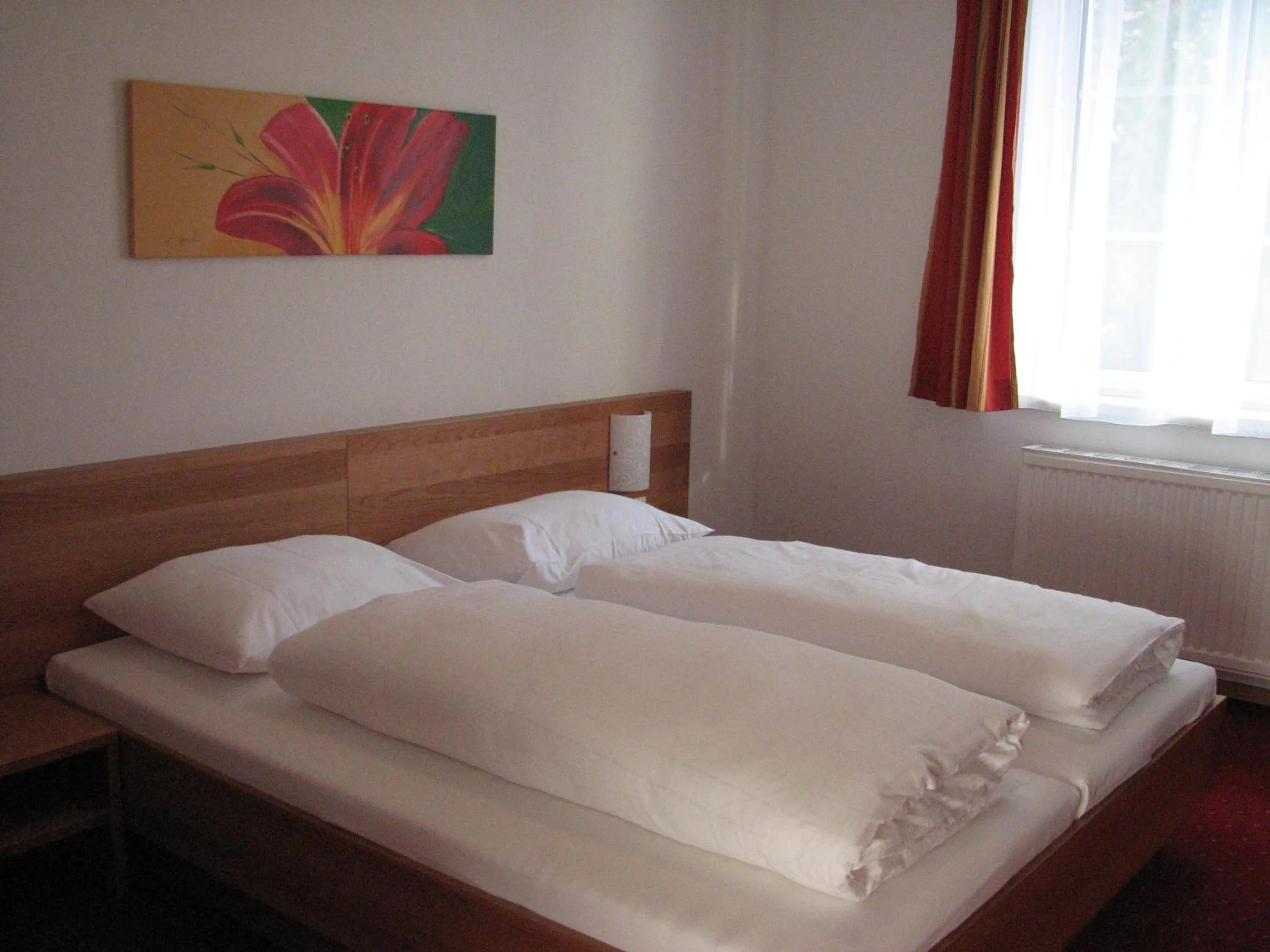 Bed in Schillerhof Hotel GARNI
