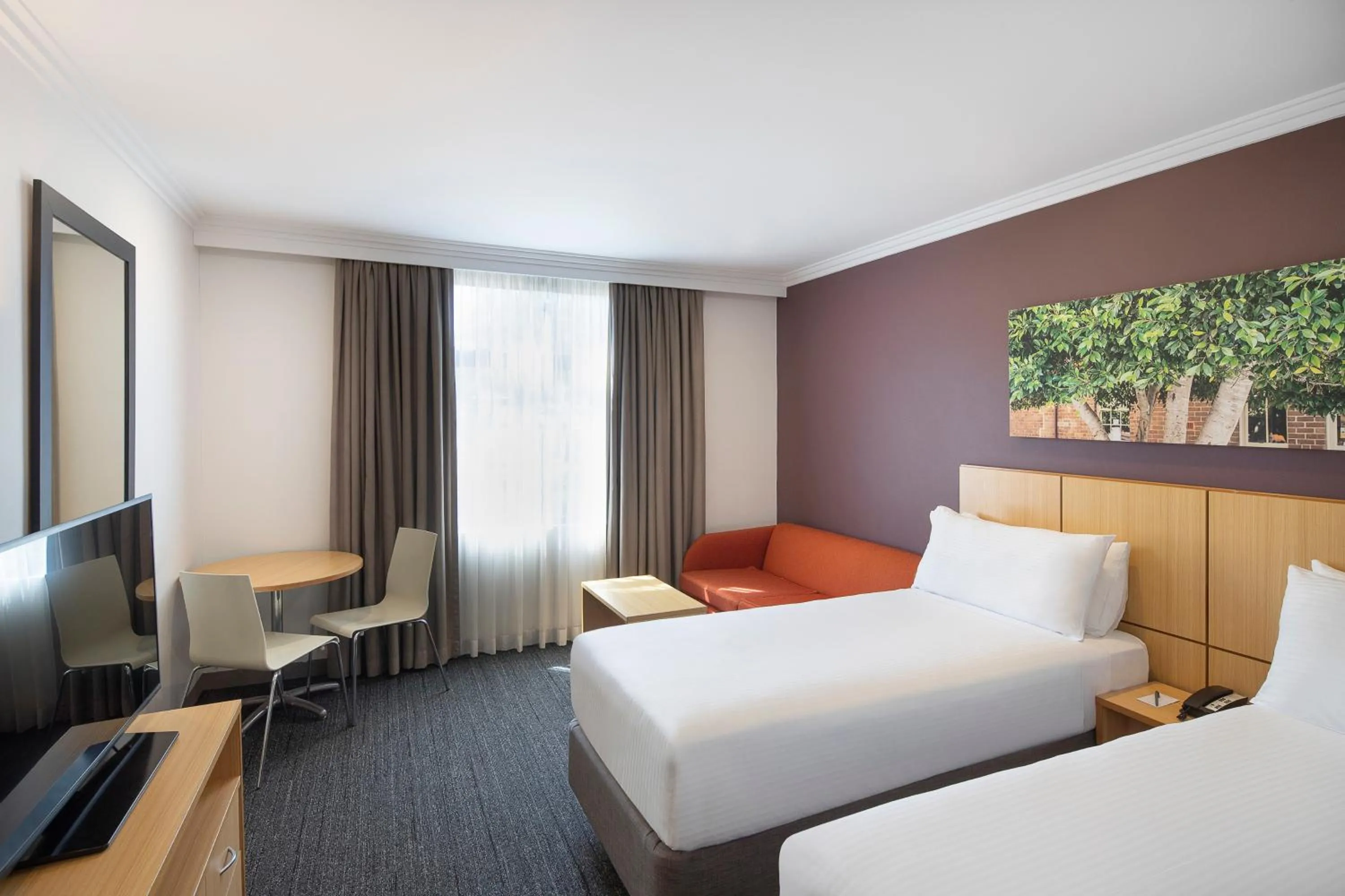 Bed in Mercure Sydney Blacktown