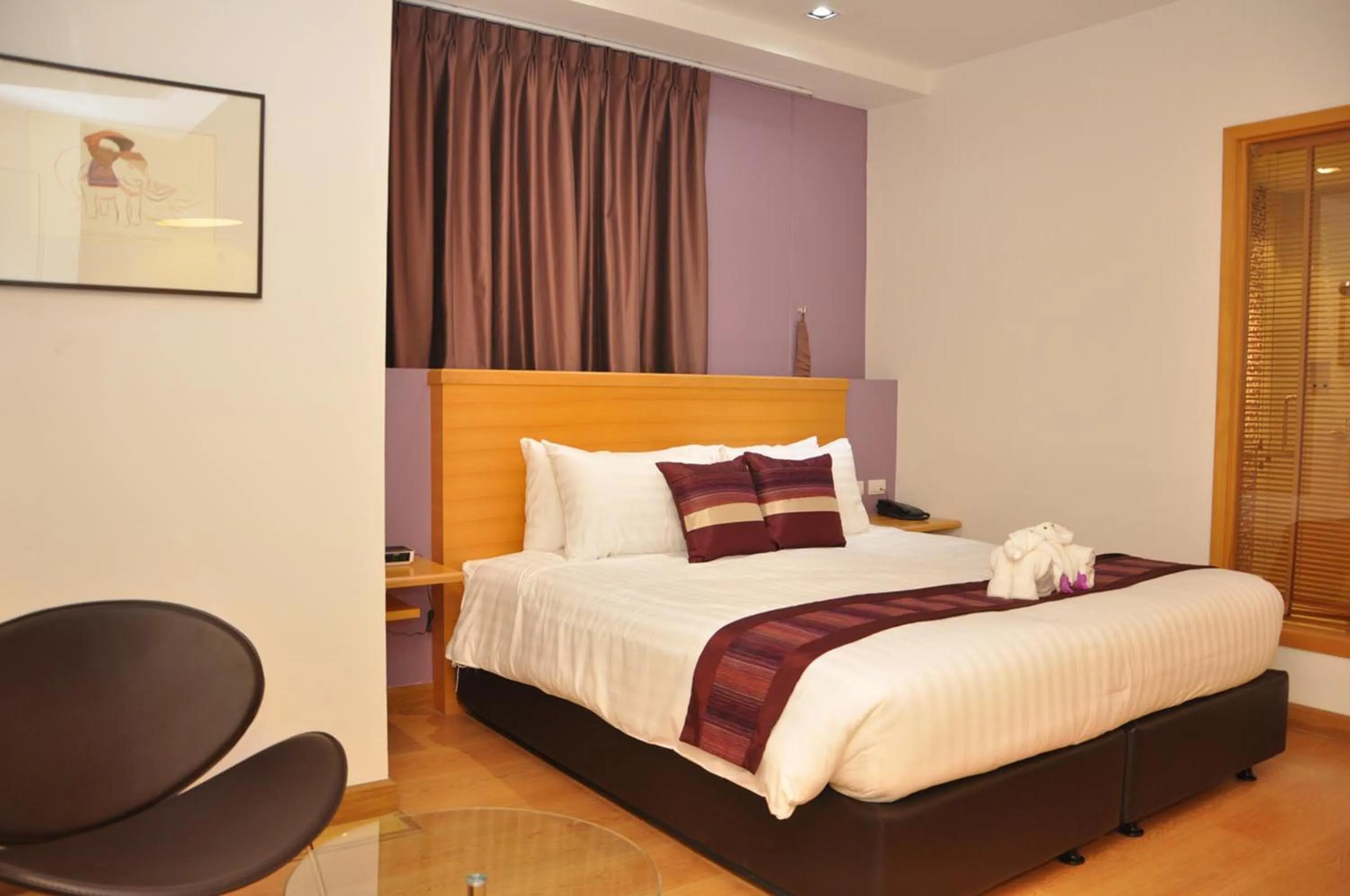 Bed in Iyarin @ Tuk Chang Hotel