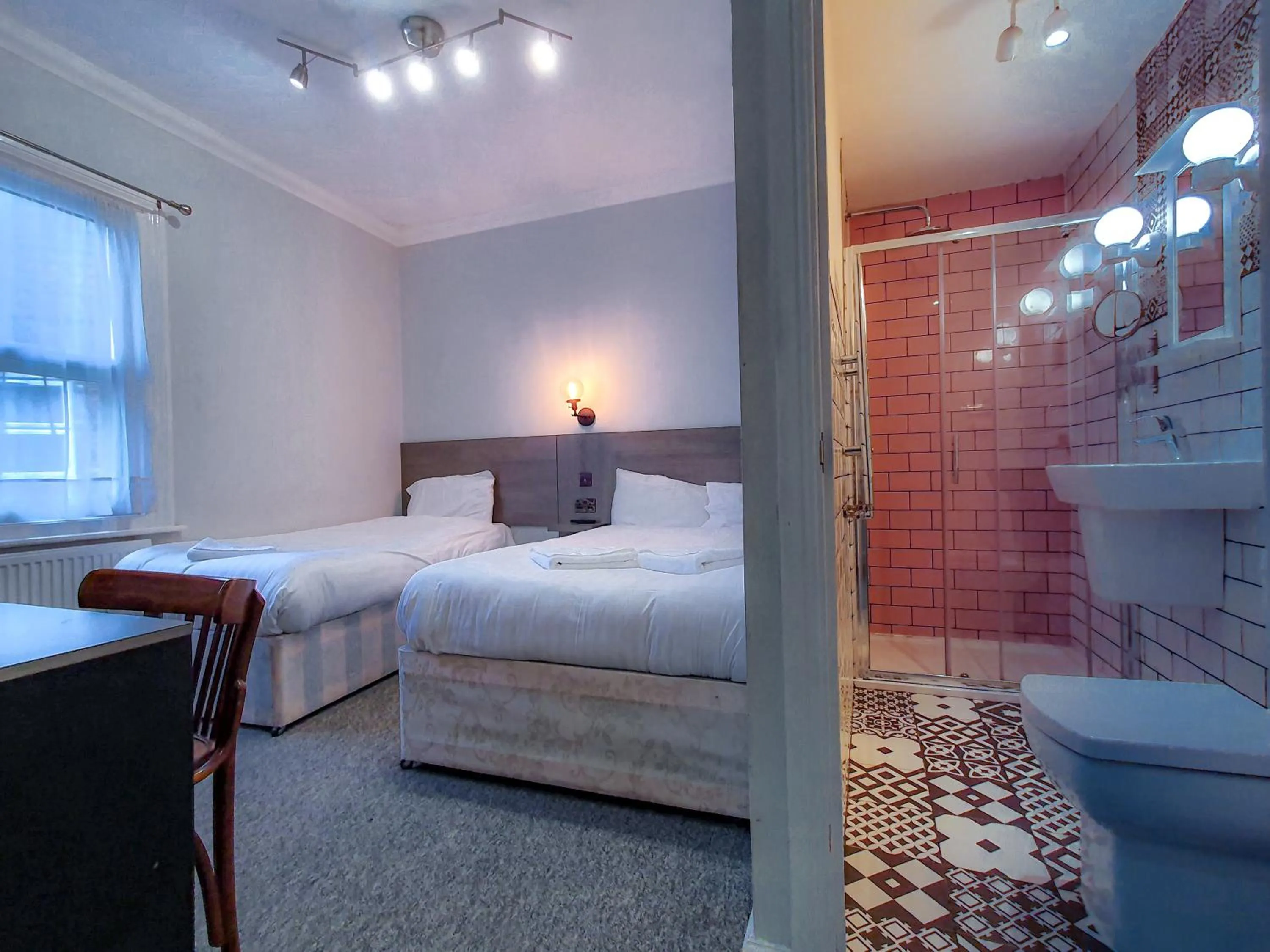 Photo of the whole room, Bed in Plaza Hotel