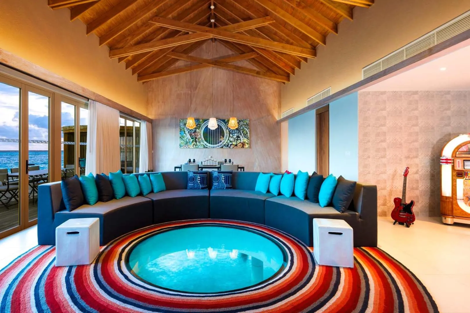 Living room in Hard Rock Hotel Maldives - FREE transfer for stays until 21st Dec 2025 and 11th Jan to 30th Apr 2026