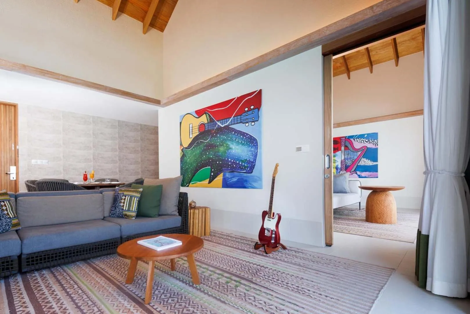 Living room in Hard Rock Hotel Maldives - FREE transfer for stays until 21st Dec 2025 and 11th Jan to 30th Apr 2026