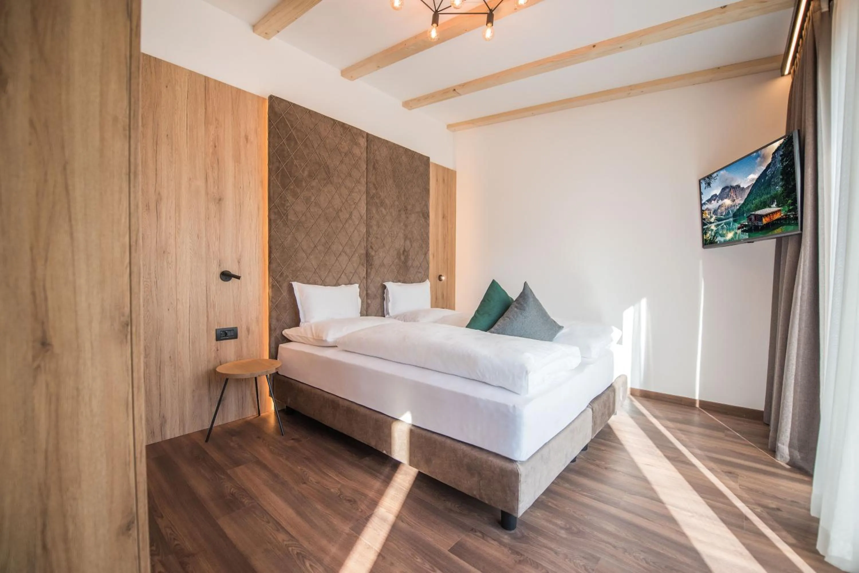 Bed in Vitaurina Royal Hotel