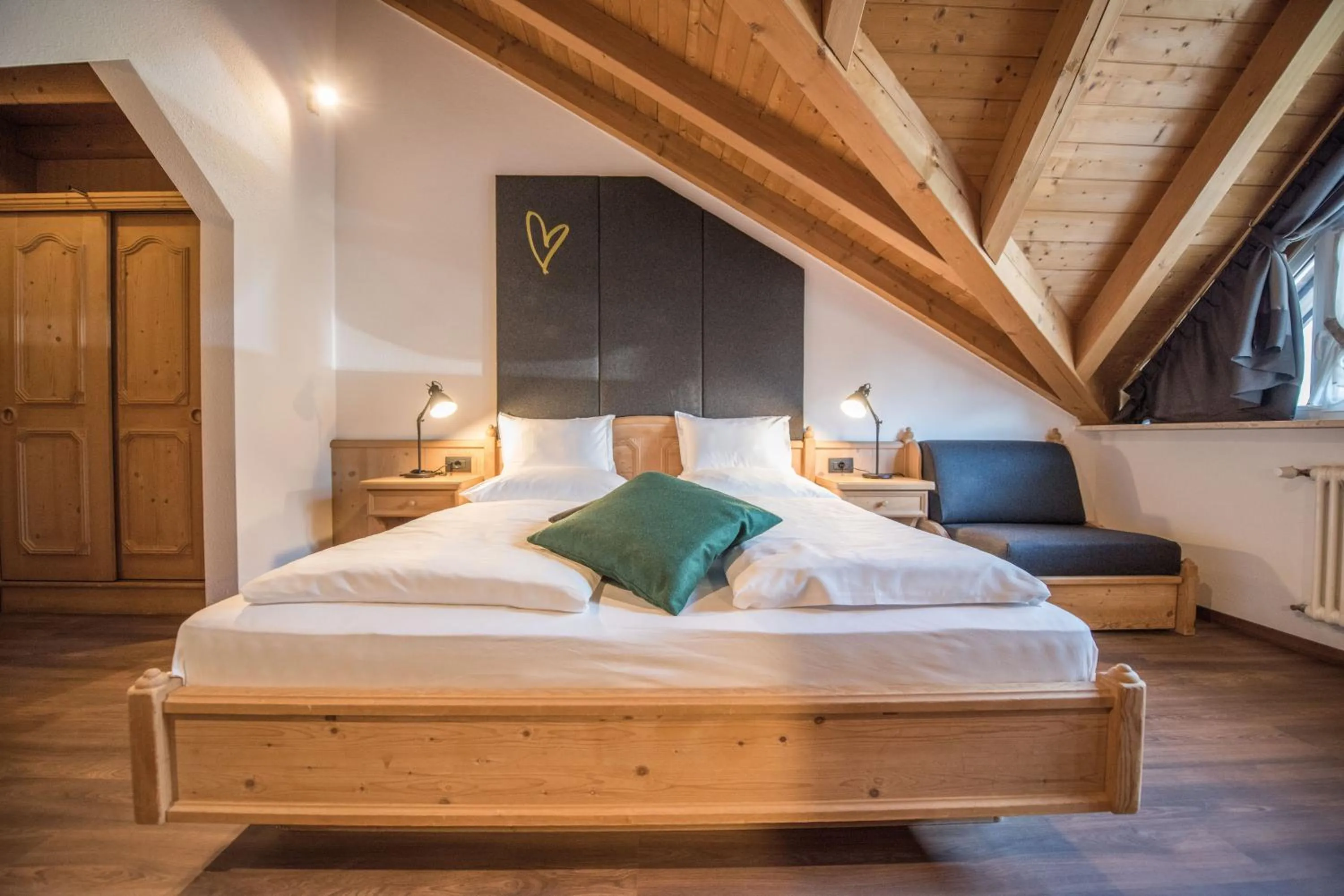 Bed in Vitaurina Royal Hotel