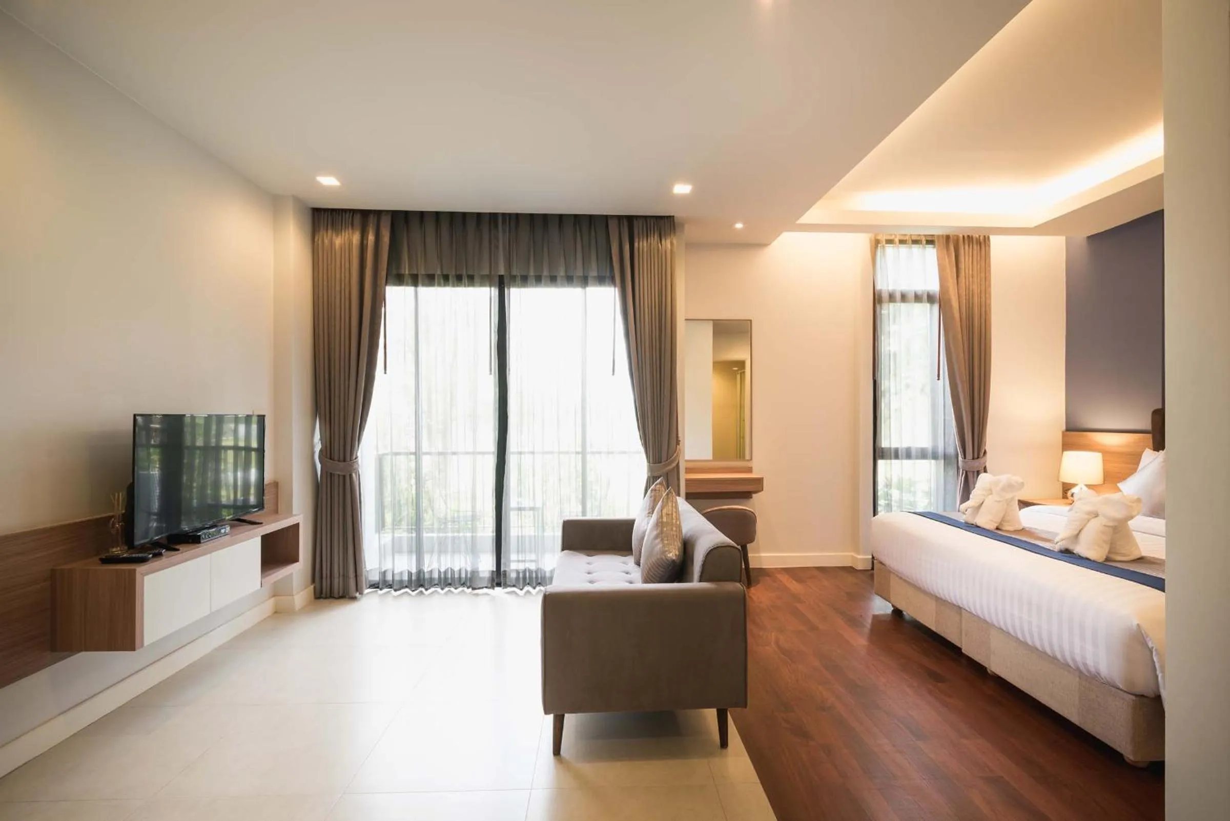 Photo of the whole room, Bed in Green Ville Laguna Hotel