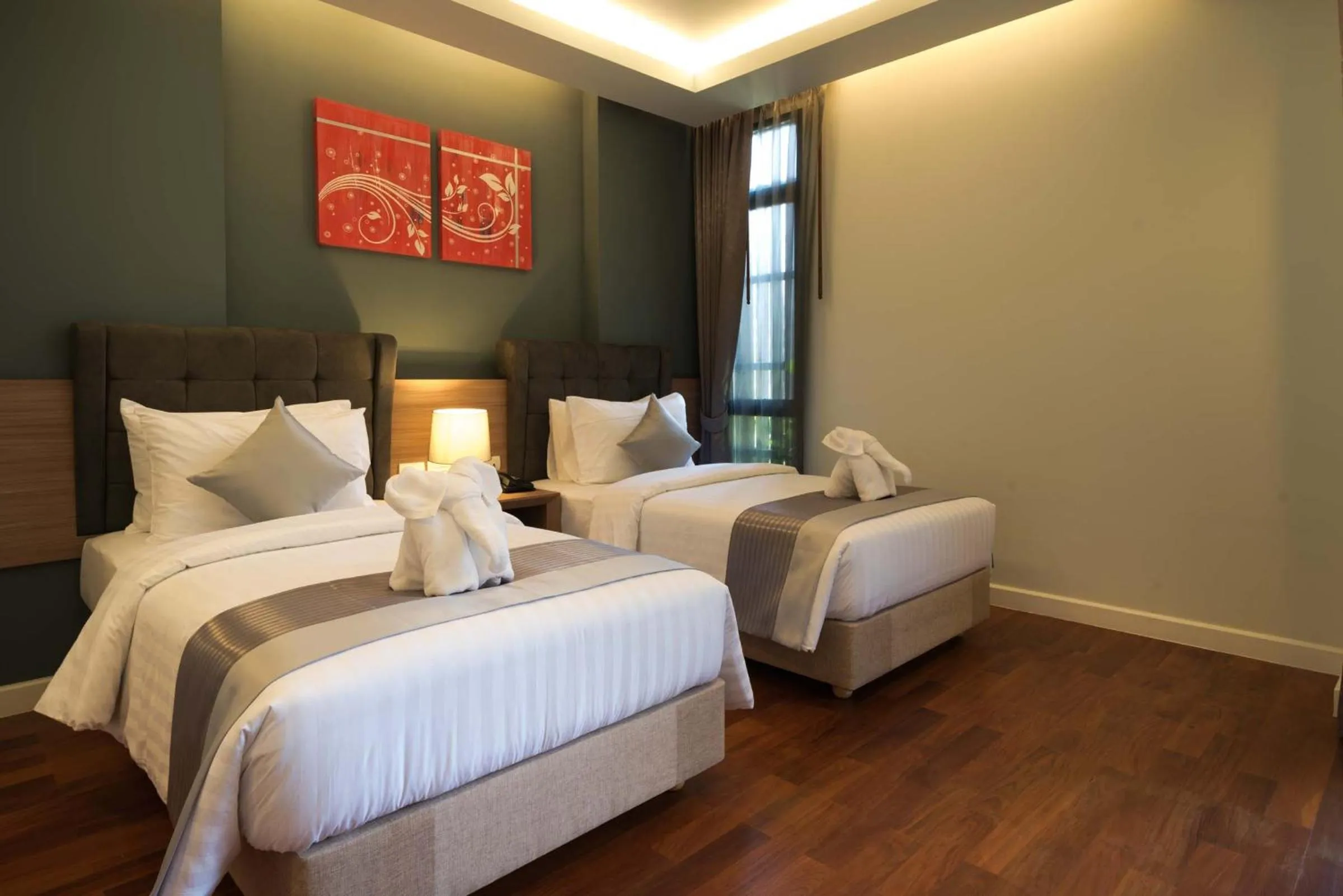 Bed in Green Ville Laguna Hotel