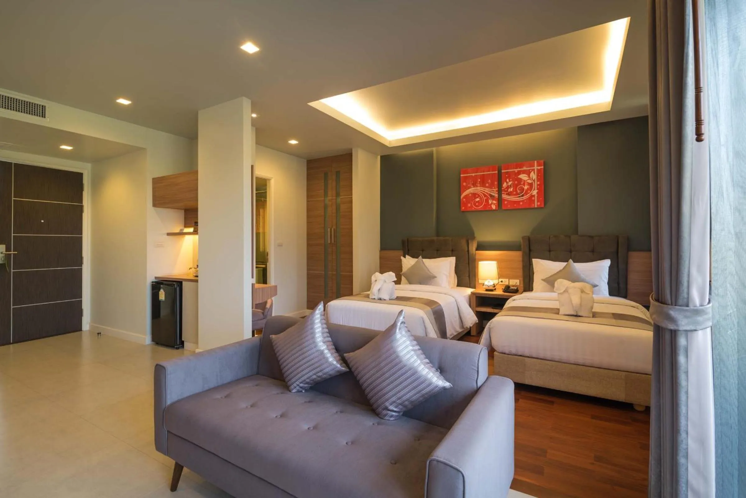 Photo of the whole room, Bed in Green Ville Laguna Hotel