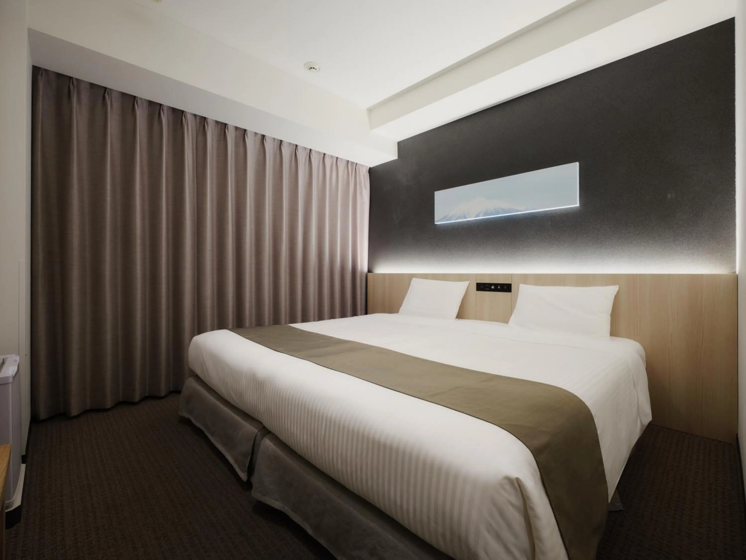 Bed in hotel MONday Premium TOYOSU