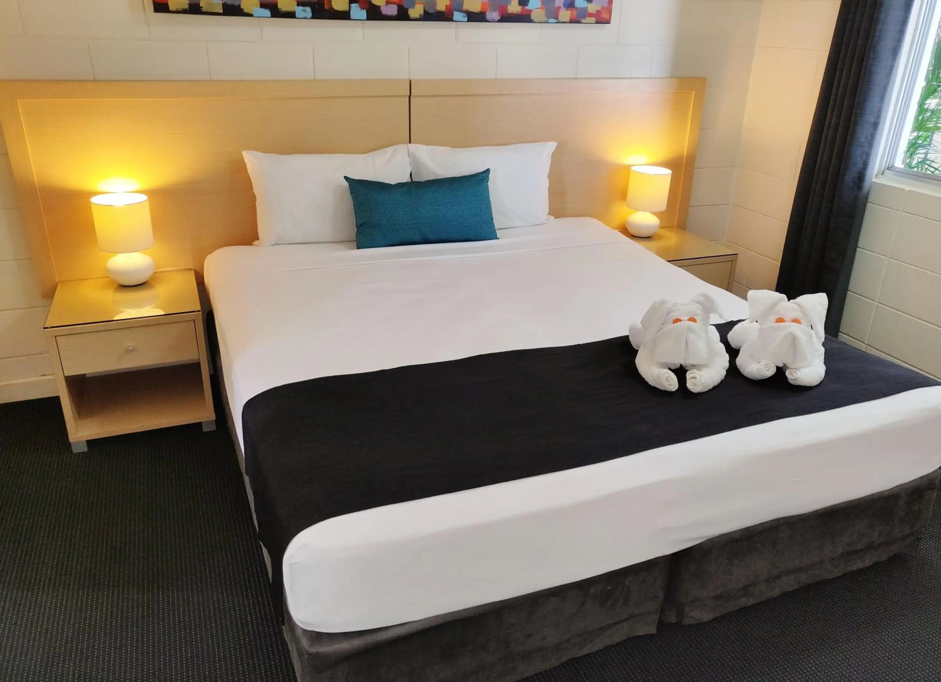 Bed in Coconut Grove Holiday Apartments