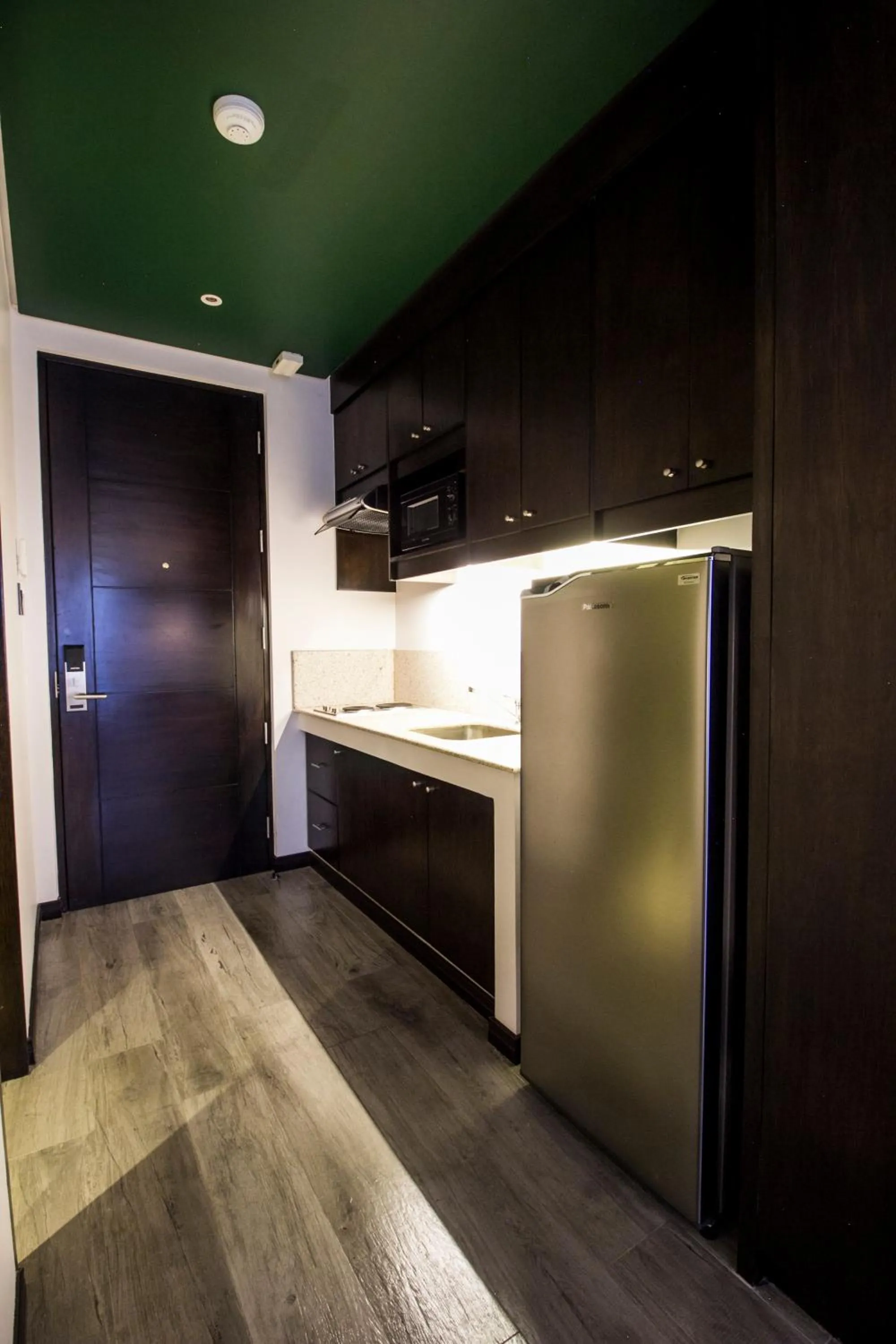 Kitchen or kitchenette in 1898 Hotel Colonia En Las Filipinas