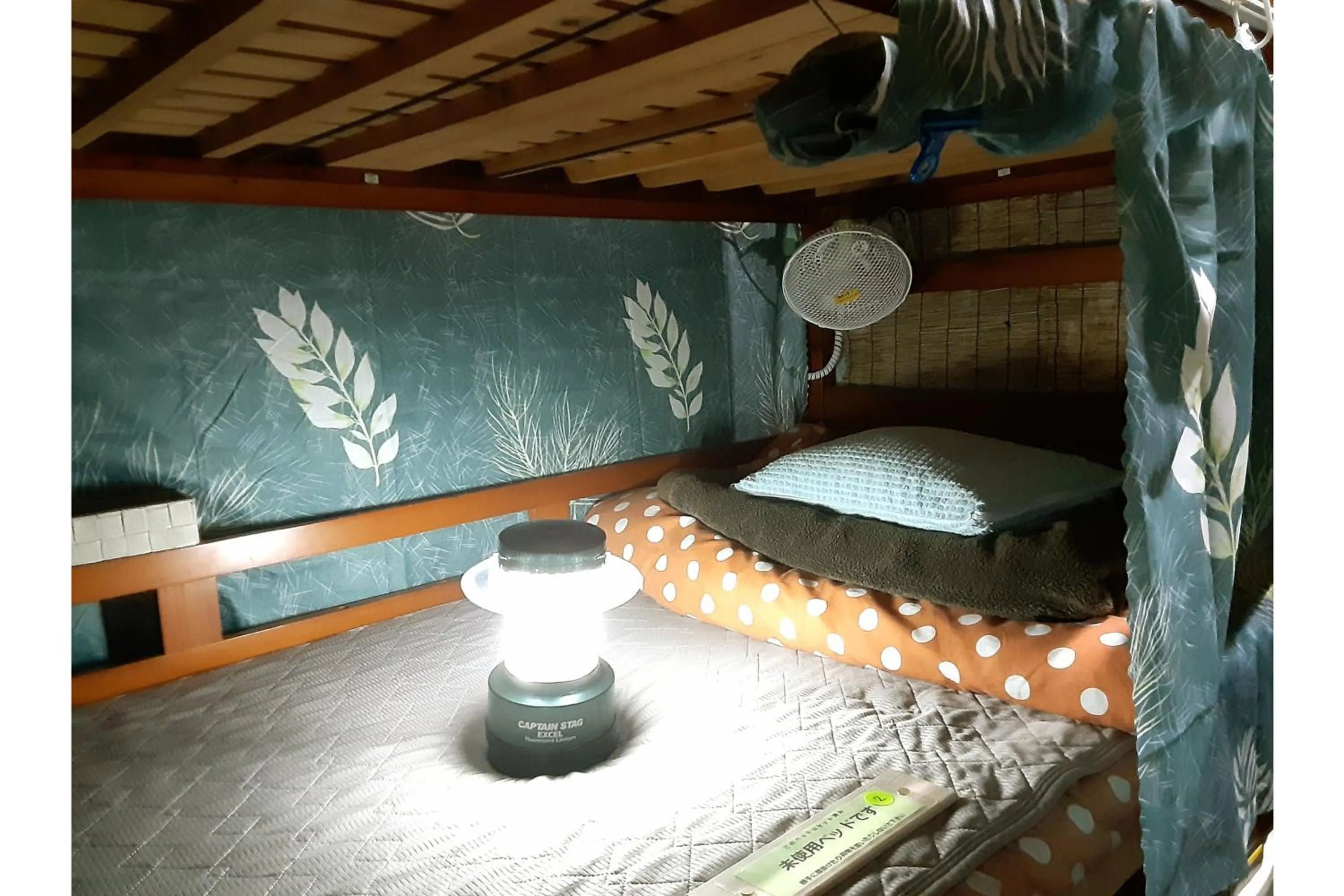 Bed in Amami Guest House showa-so