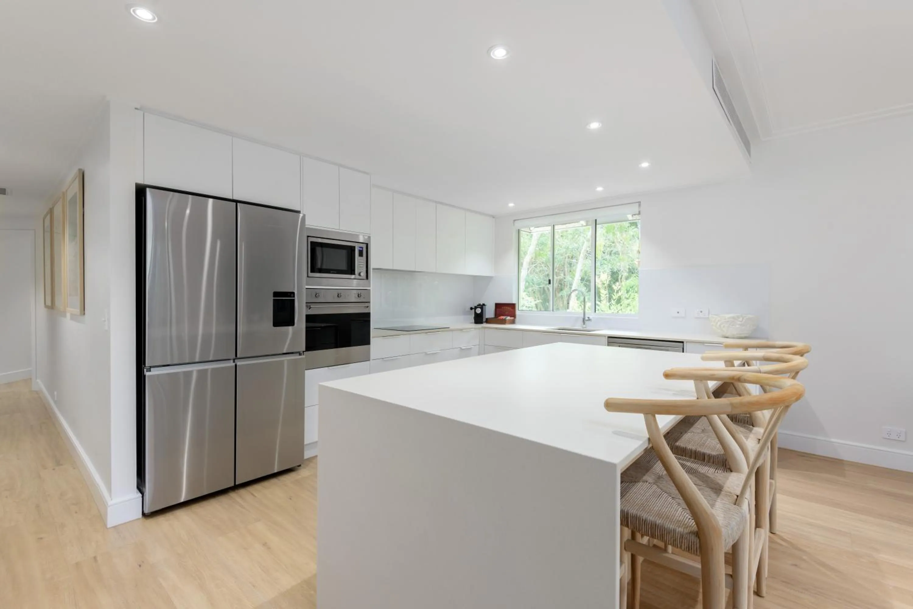 Kitchen or kitchenette in Mandalay Luxury Beachfront Apartments