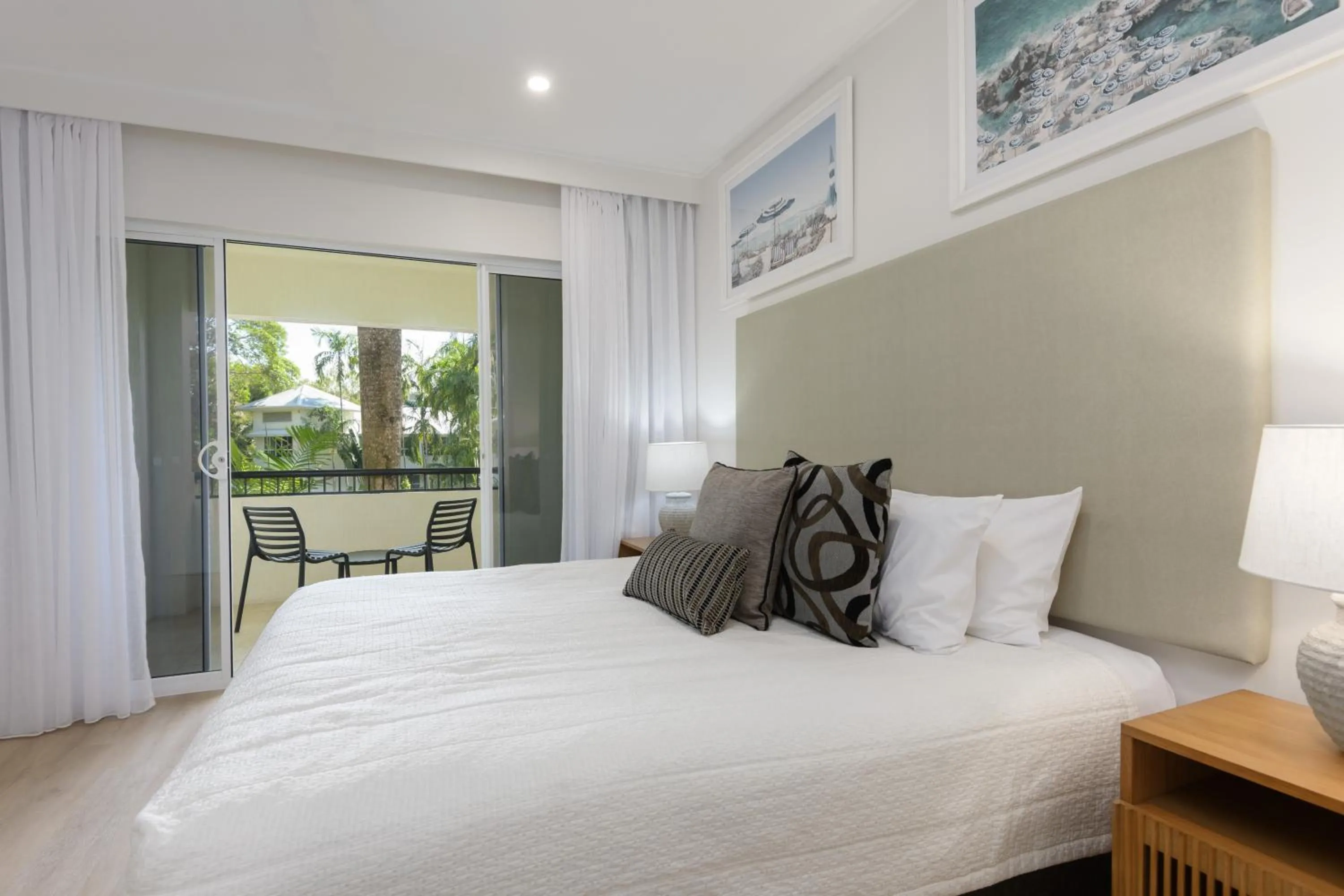 Bed in Mandalay Luxury Beachfront Apartments