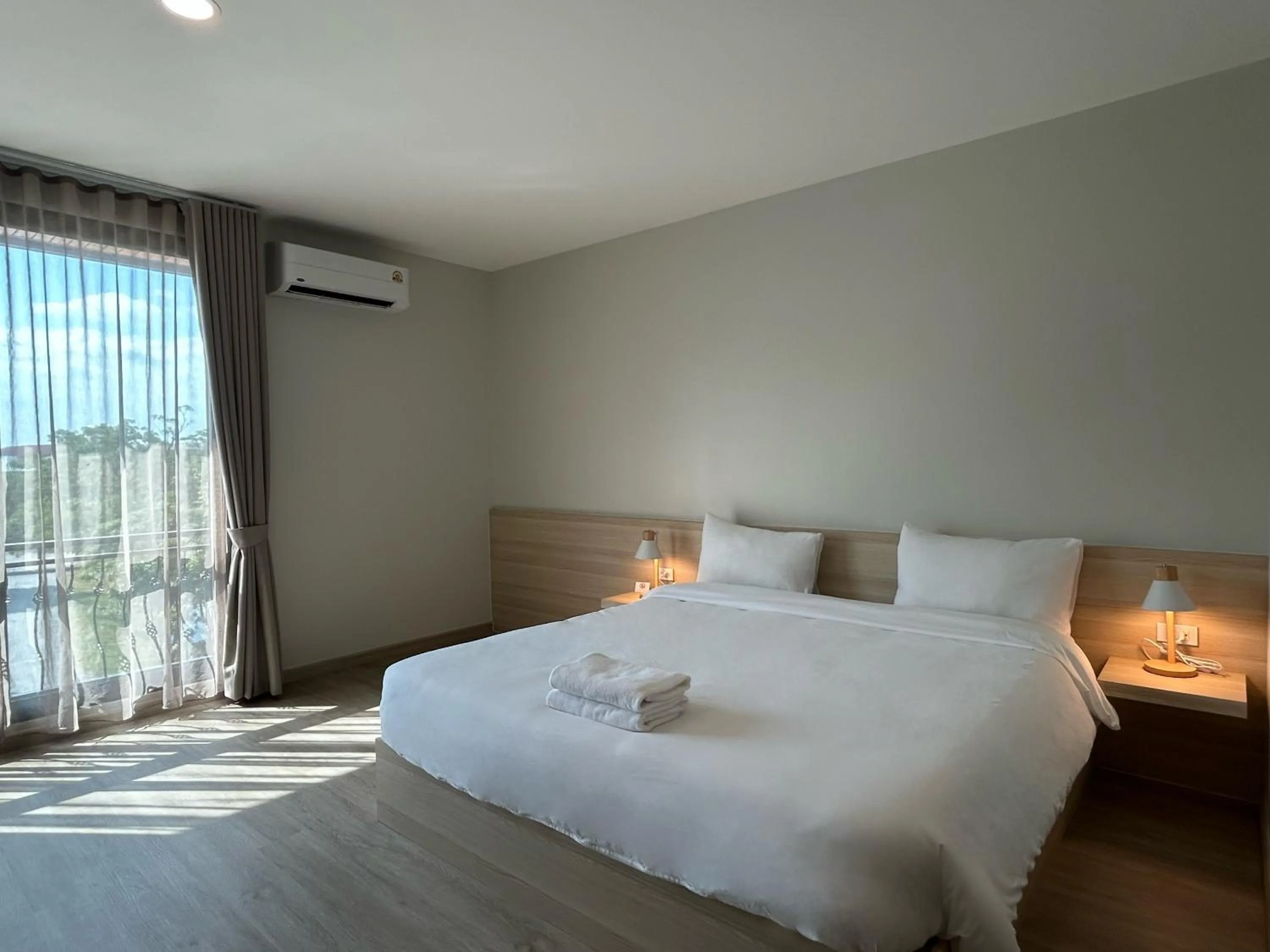 Bed in DD Boutique Resort