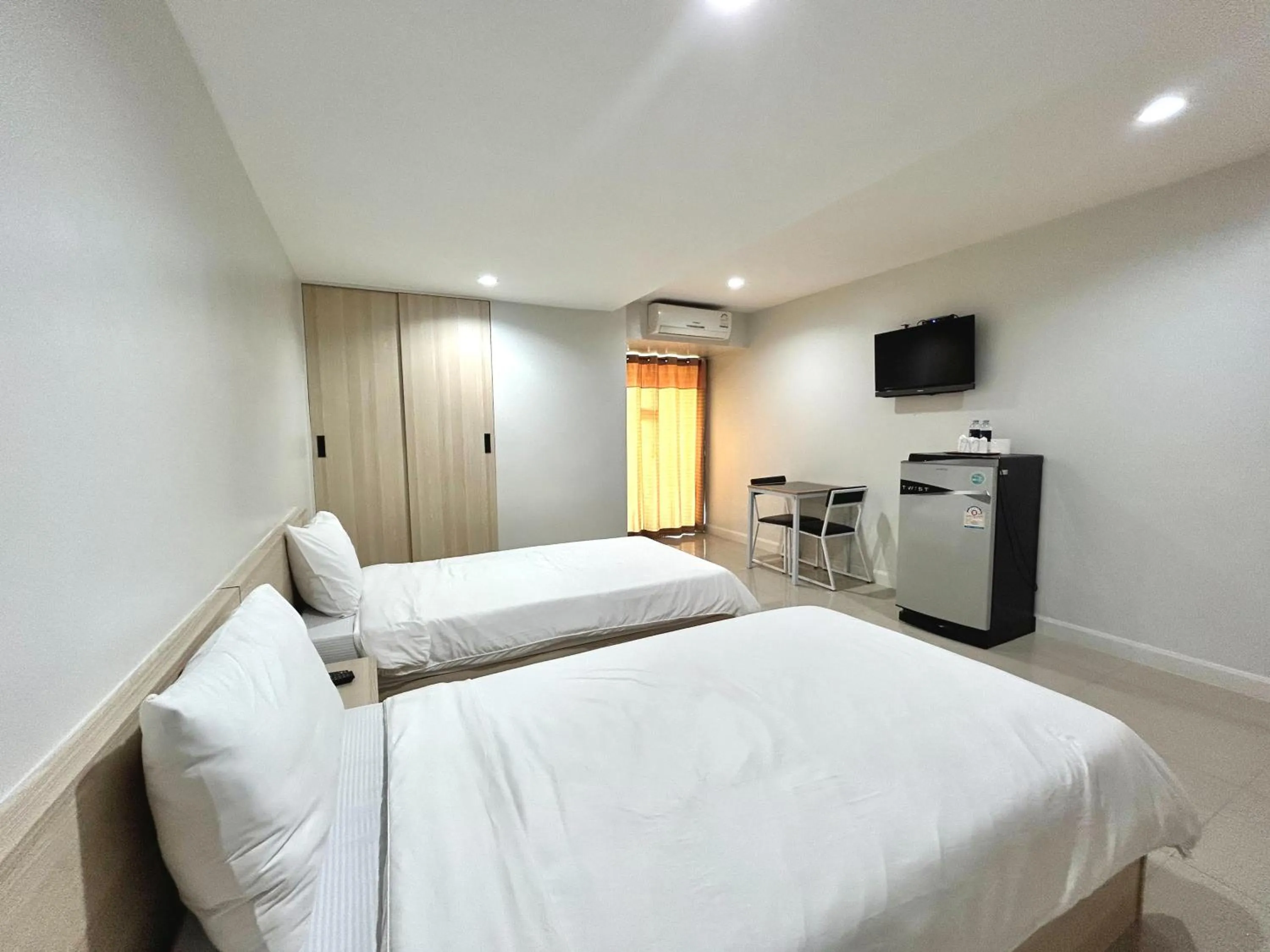 Bed in DD Boutique Resort