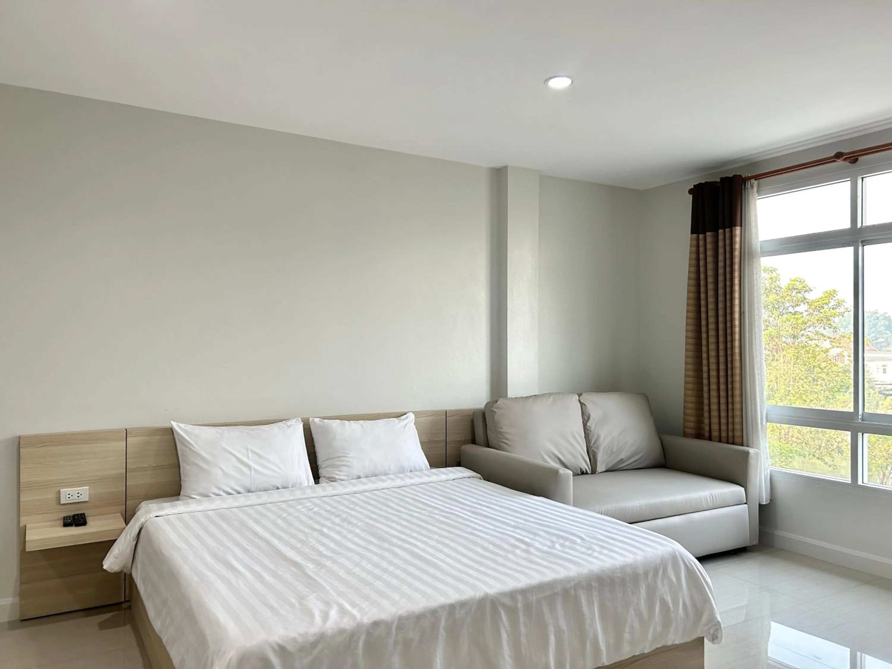 Bed in DD Boutique Resort