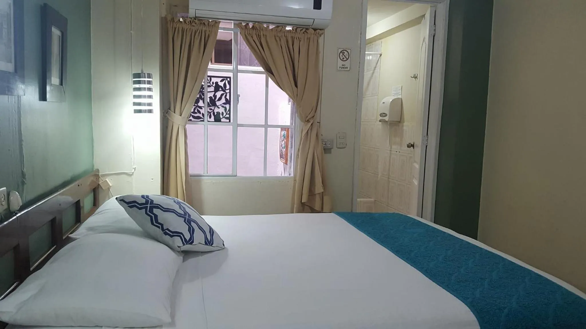 Bedroom, Bed in Hotel Tazumal House