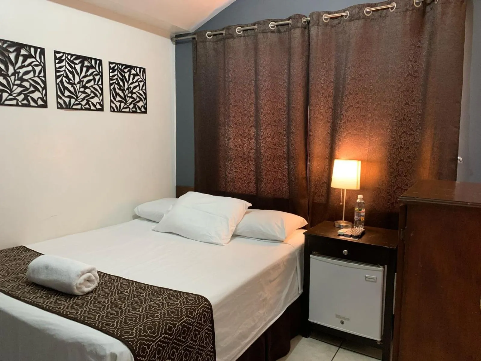 Bed in Hotel Tazumal House