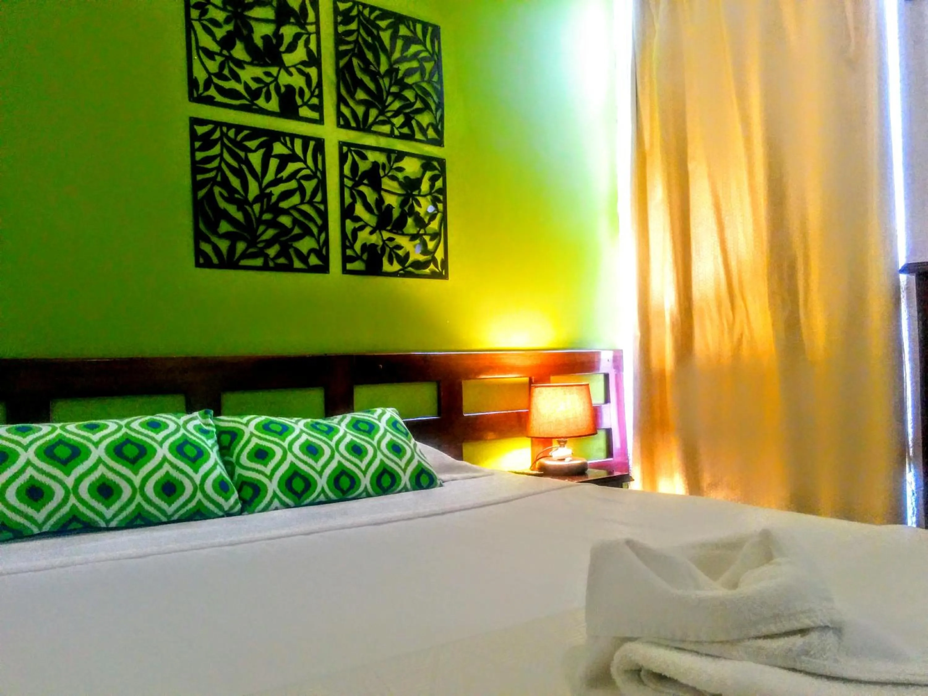 Bed in Hotel Tazumal House